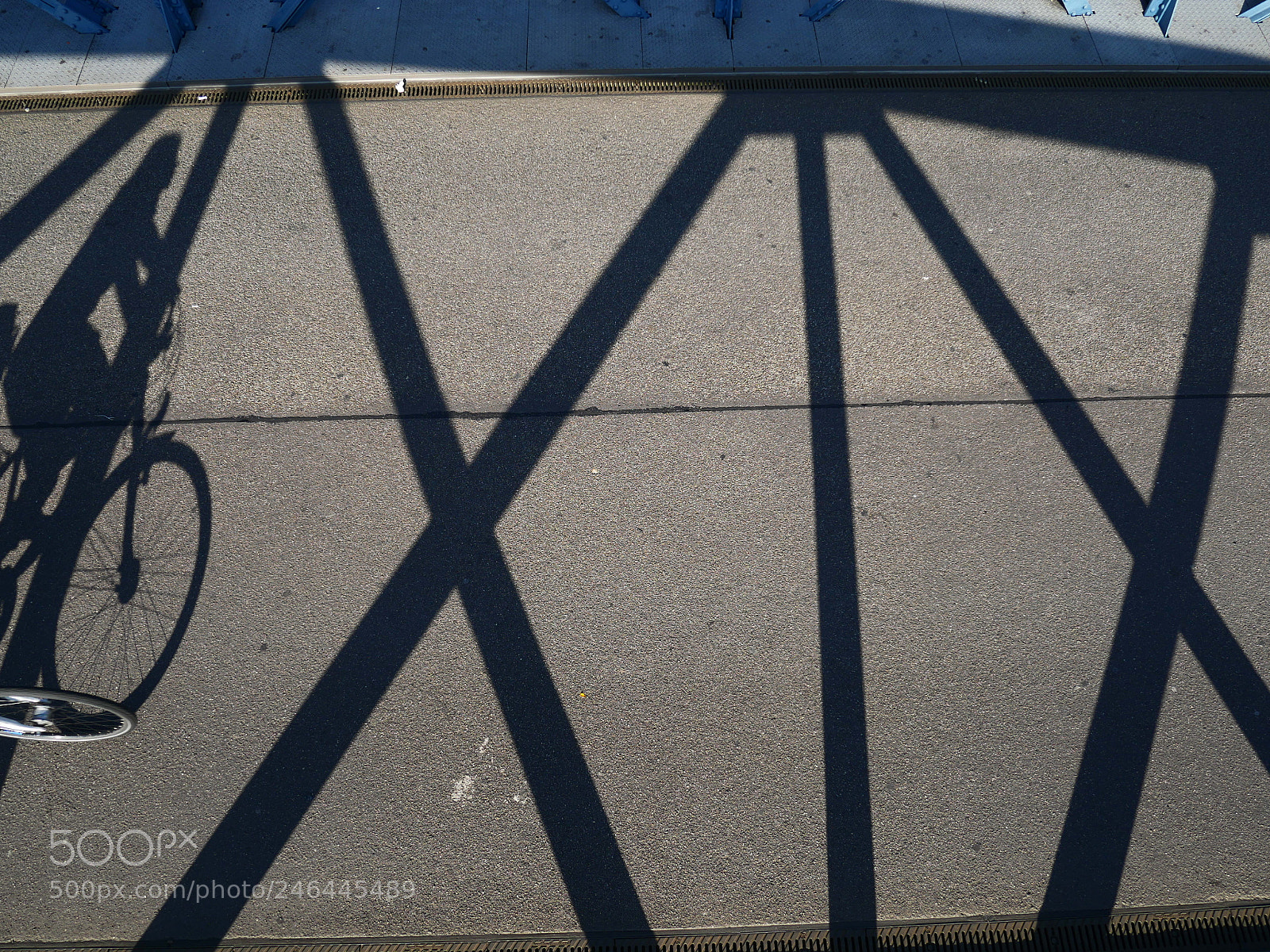 Panasonic Lumix DMC-GH4 sample photo. Cyclist shadow photography