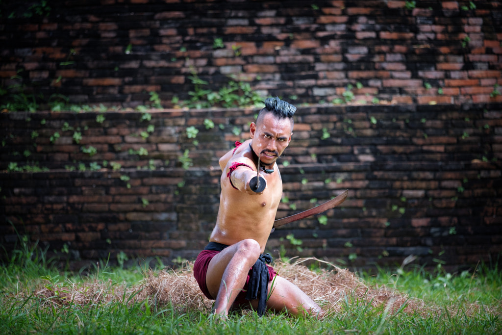 Thai legend warrior action. Ancient soldier holding swords ready by Tong Patong on 500px.com