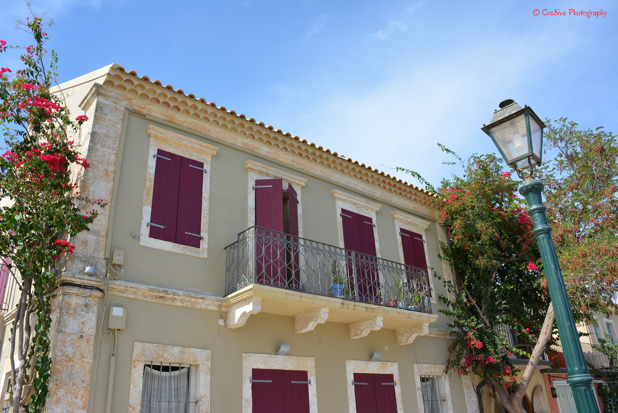 Nikon D5200 sample photo. Flowery house in sunny fiskardo photography