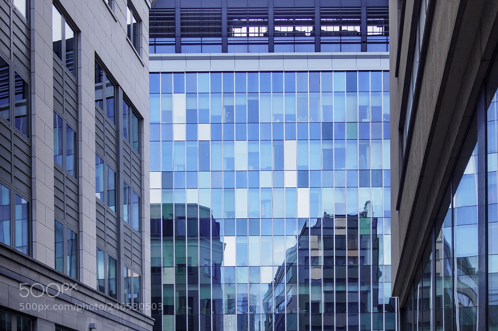 Olympus OM-D E-M10 sample photo. Collidig buildings i photography