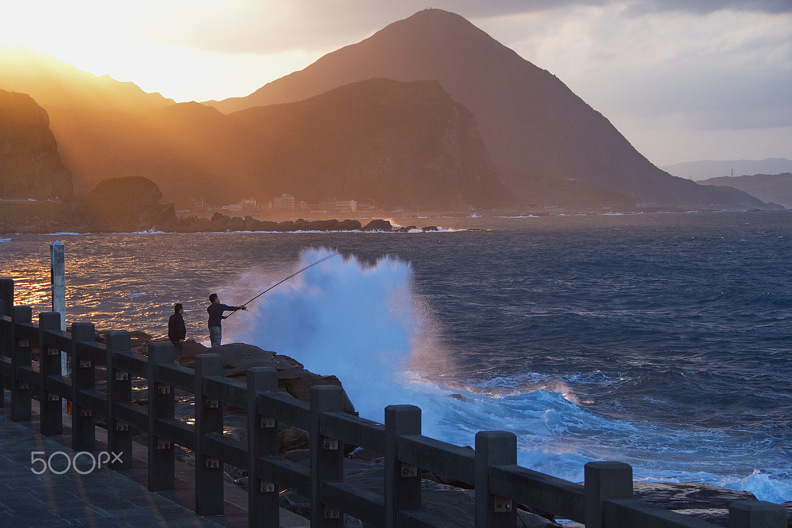 Canon EOS 60D sample photo. Brave guys fighting treacherous waves photography