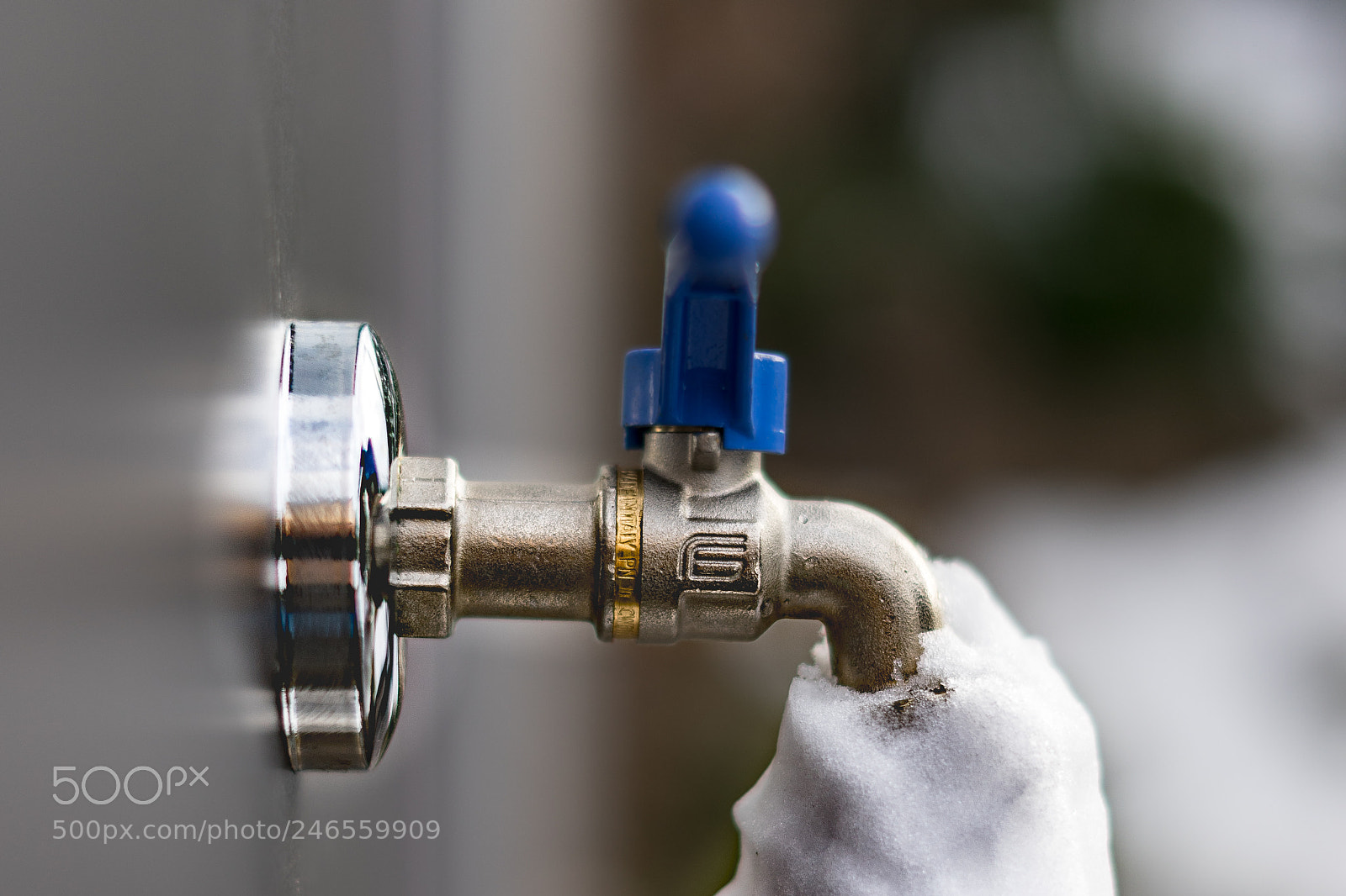 Sony a7 sample photo. Water tap in winter photography