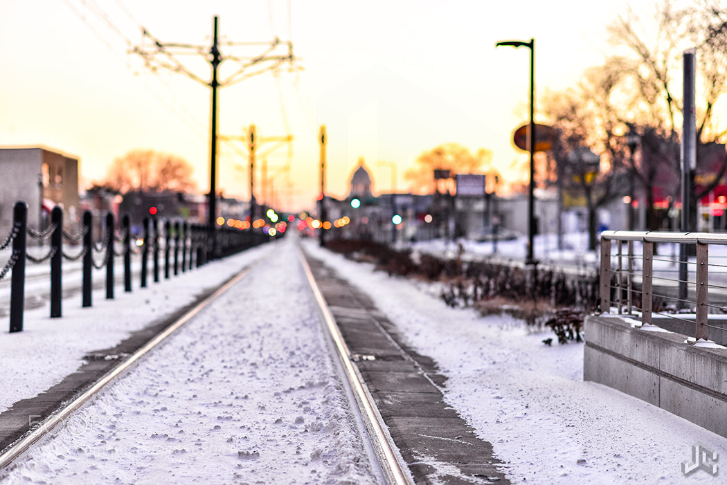 Nikon D610 sample photo. Light rail bokeh in photography