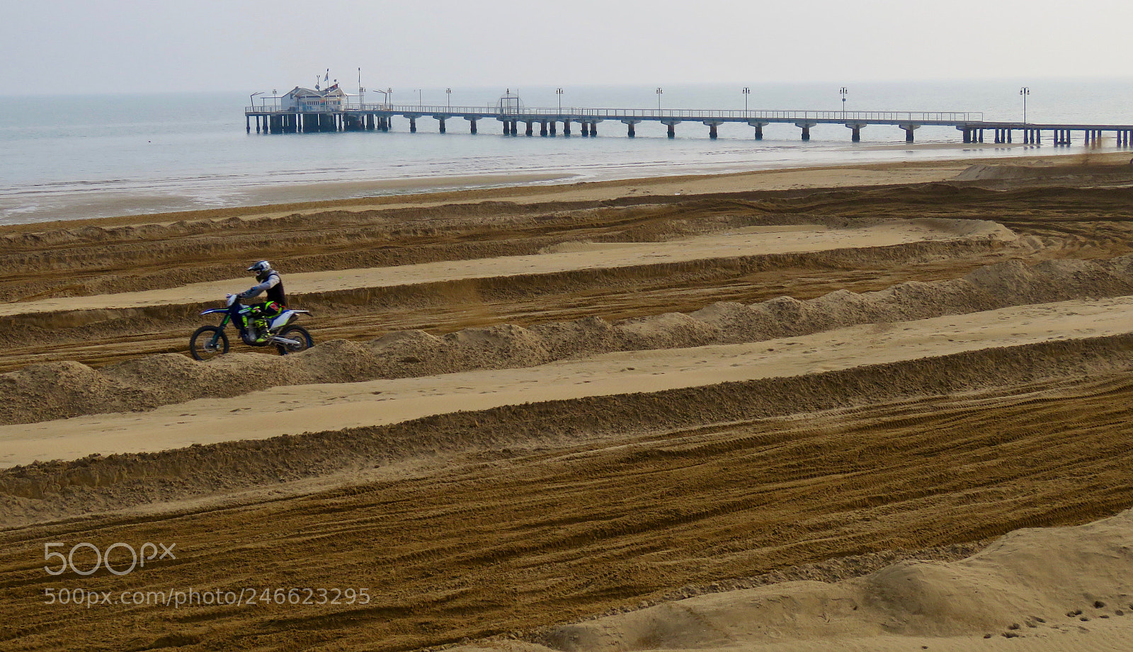 Canon PowerShot SX60 HS sample photo. Moto on the beach photography
