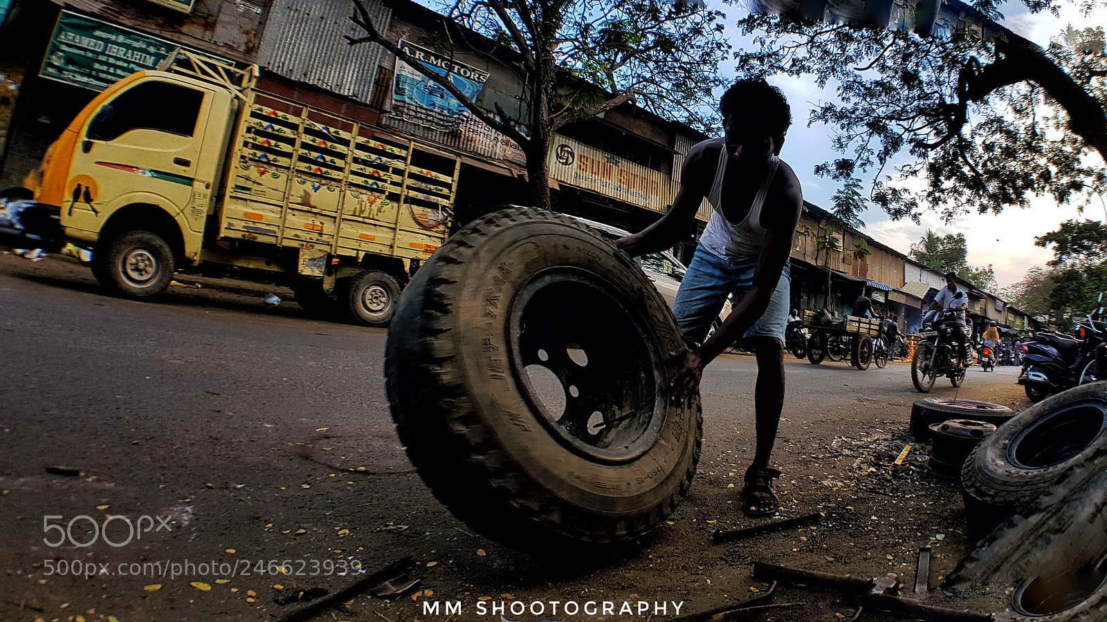 Samsung Galaxy S8+ sample photo. Hard work tyre men's photography
