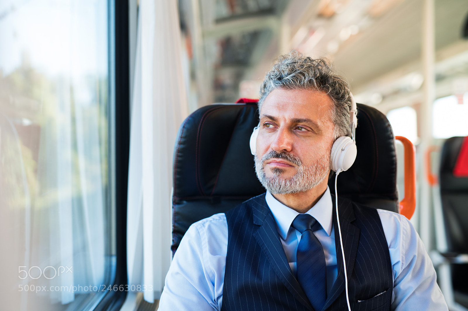 Nikon D5 sample photo. Mature businessman with headphones photography