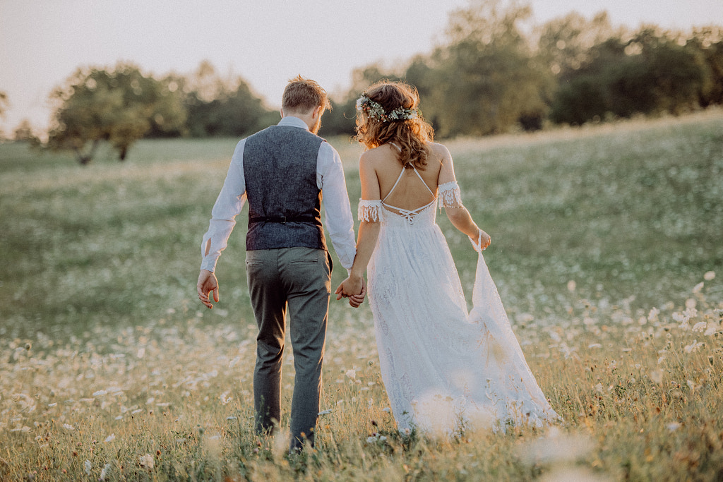 Beautiful bride and groom at sunset in green nature. by Jozef Polc on 500px.com