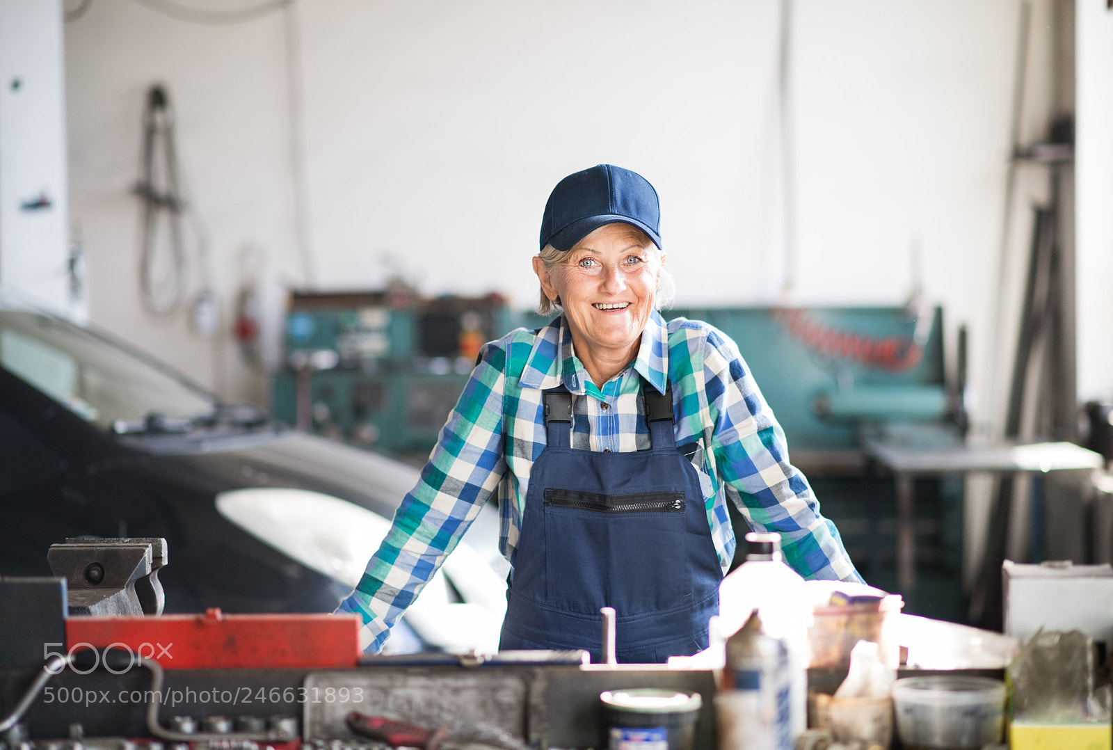 Nikon D5 sample photo. Senior female mechanic repairing photography