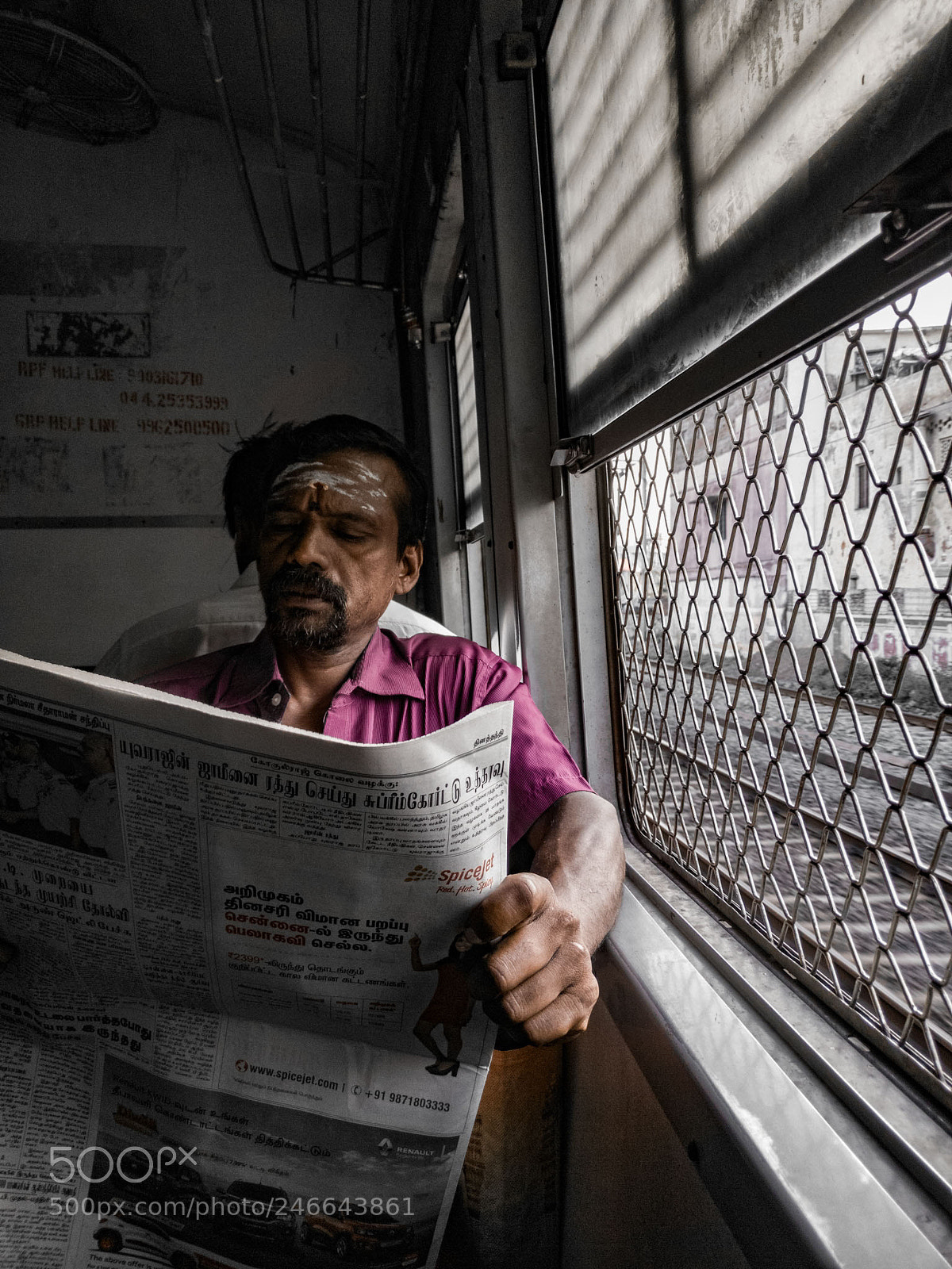 OnePlus A3003 sample photo. A man reading his photography