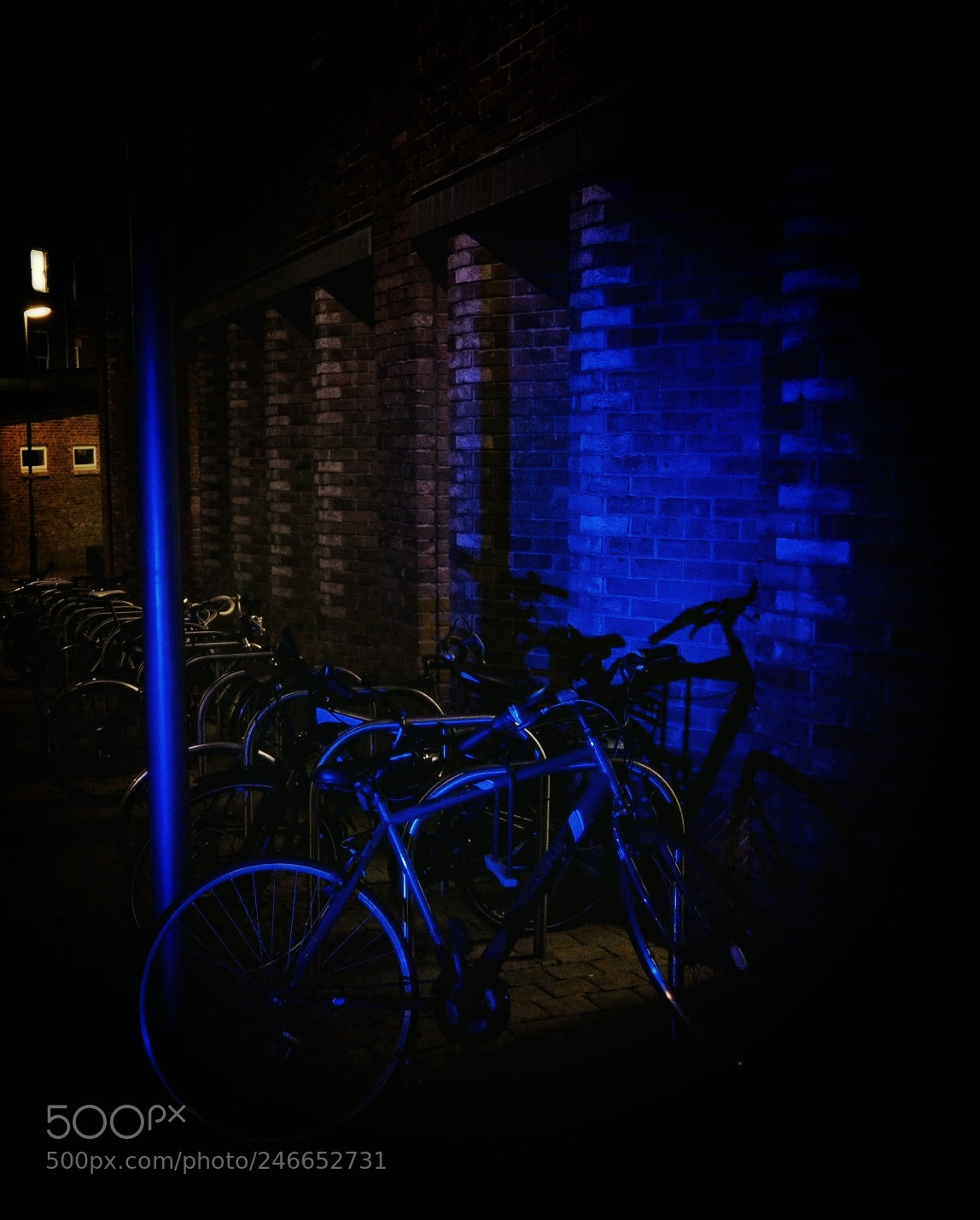 Olympus OM-D E-M10 II sample photo. Bikes at night photography