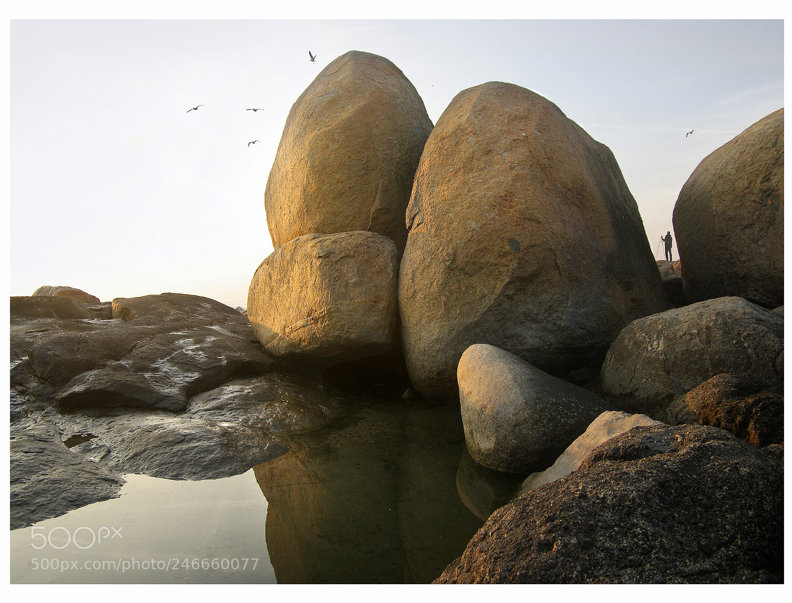Pentax K20D sample photo. Tiny photographer among rocks photography