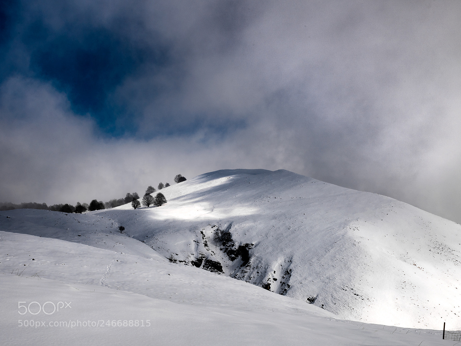 Nikon D810 sample photo. Clouds, sun and snow photography