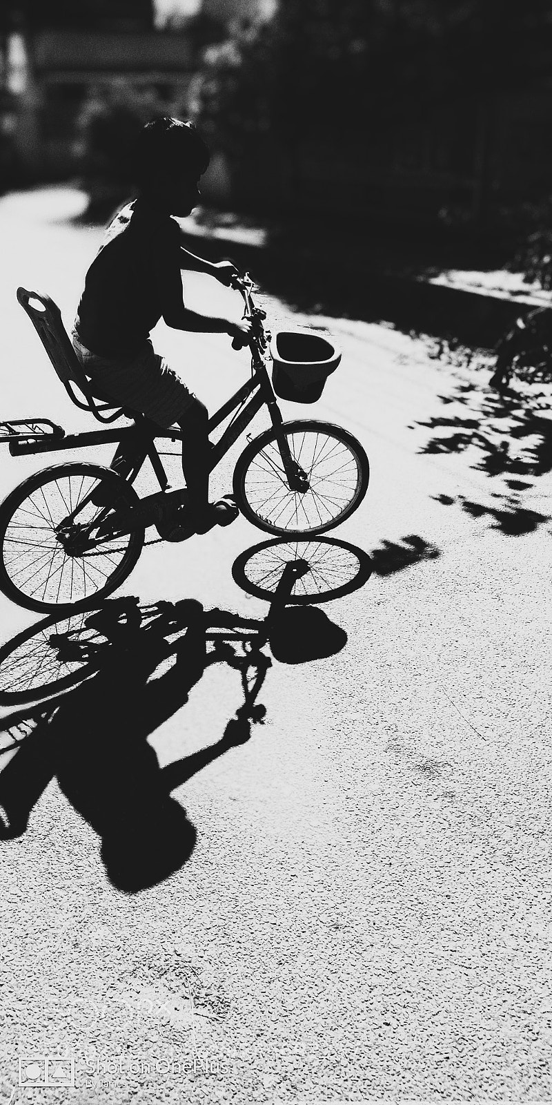 OnePlus 5T sample photo. Child riding bicycle photography
