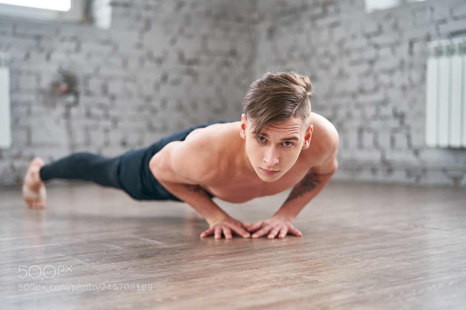 Sony a9 sample photo. Athletic young man doing photography