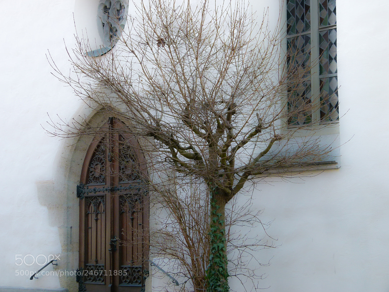 Panasonic Lumix DMC-FZ100 sample photo. Church entrance photography