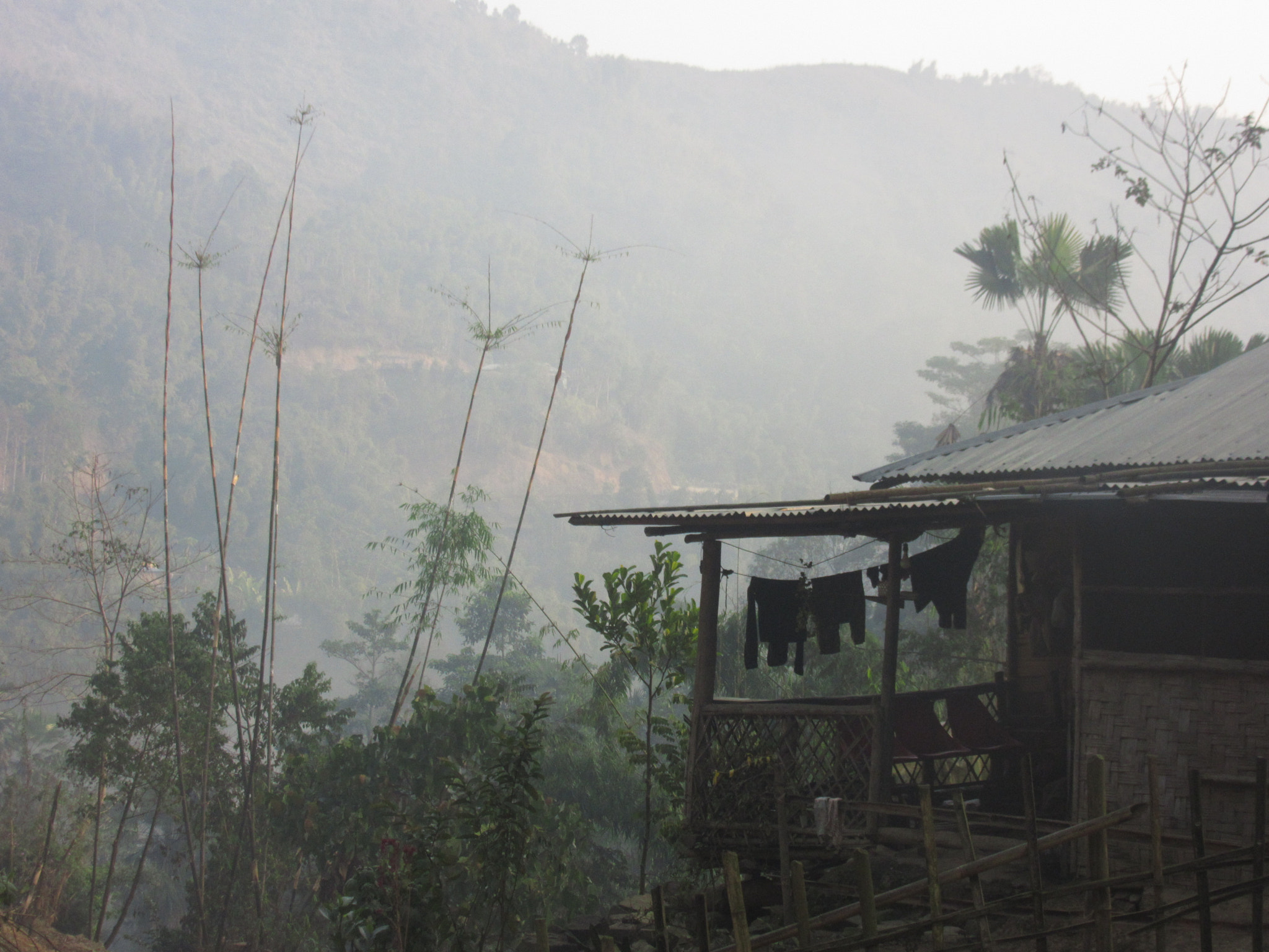 Canon PowerShot SX600 HS sample photo. Hut and landscape on foggy day in nagaland photography