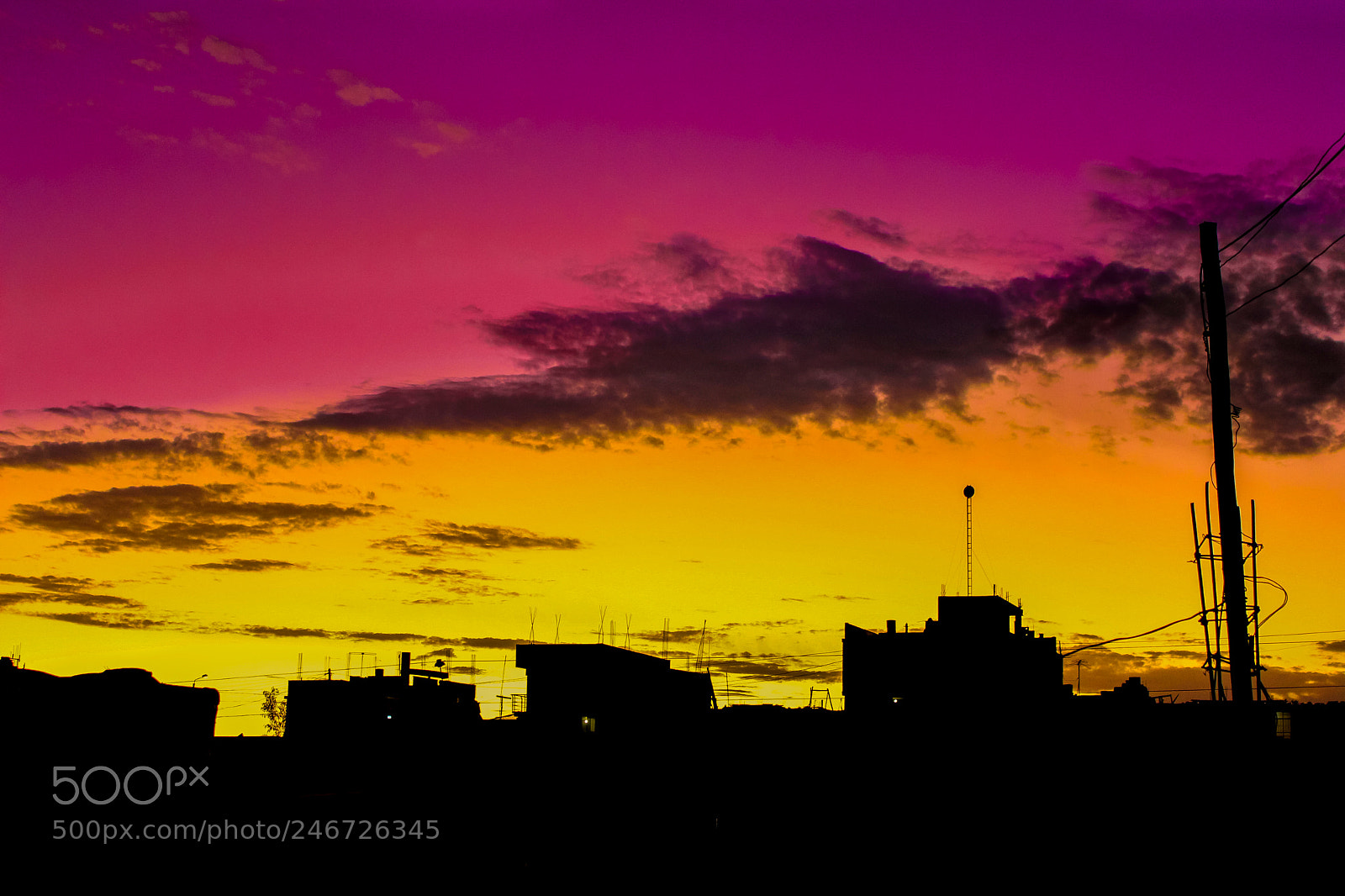 Canon EOS 700D (EOS Rebel T5i / EOS Kiss X7i) sample photo. Sunset over the houses photography