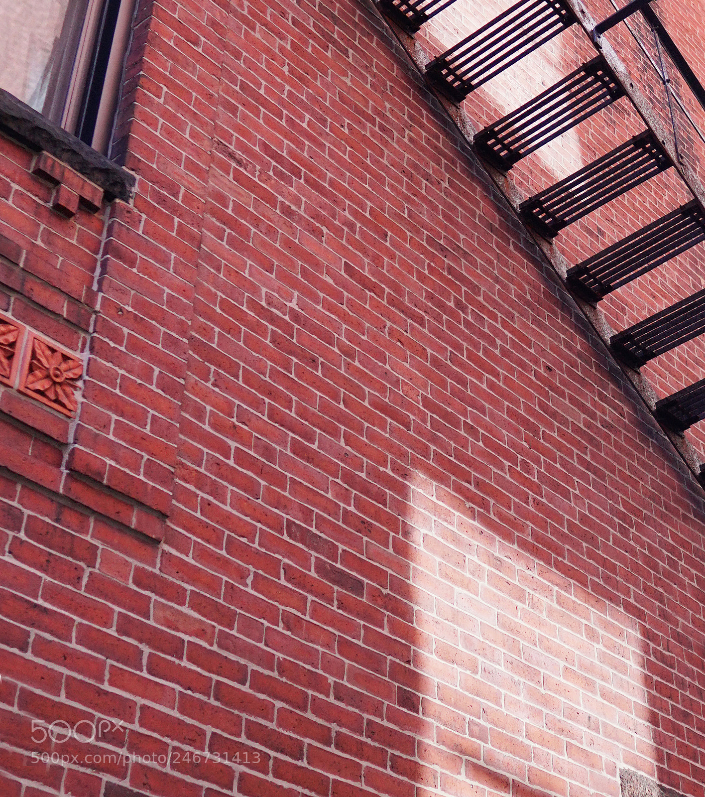 Sony a6500 sample photo. Brick wall fire escape photography