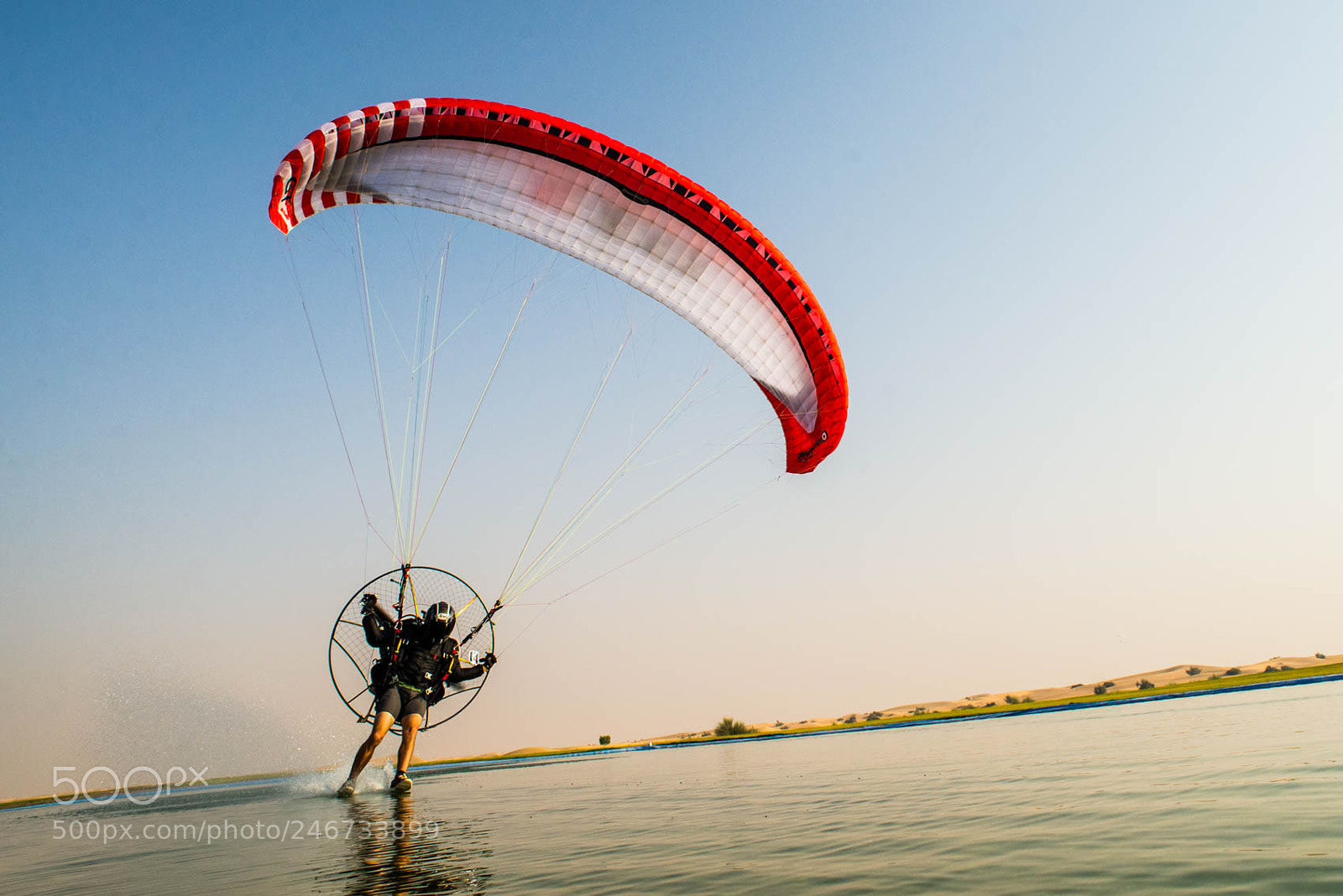 Nikon D600 sample photo. A paramotor pilot demonstrating photography