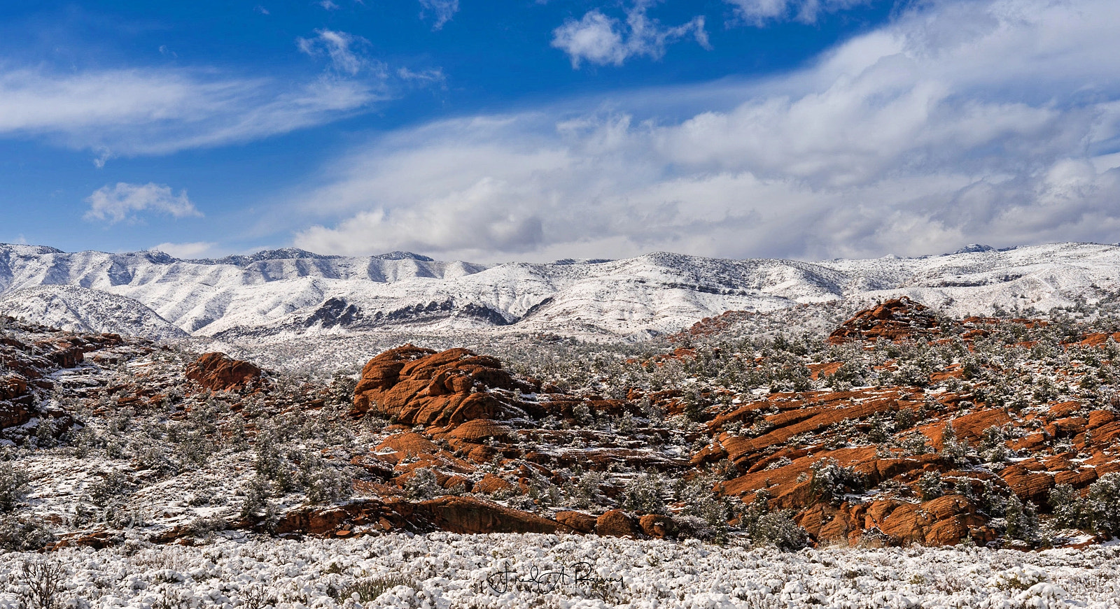 Nikon D810 sample photo. Sky-sandstone-snow photography