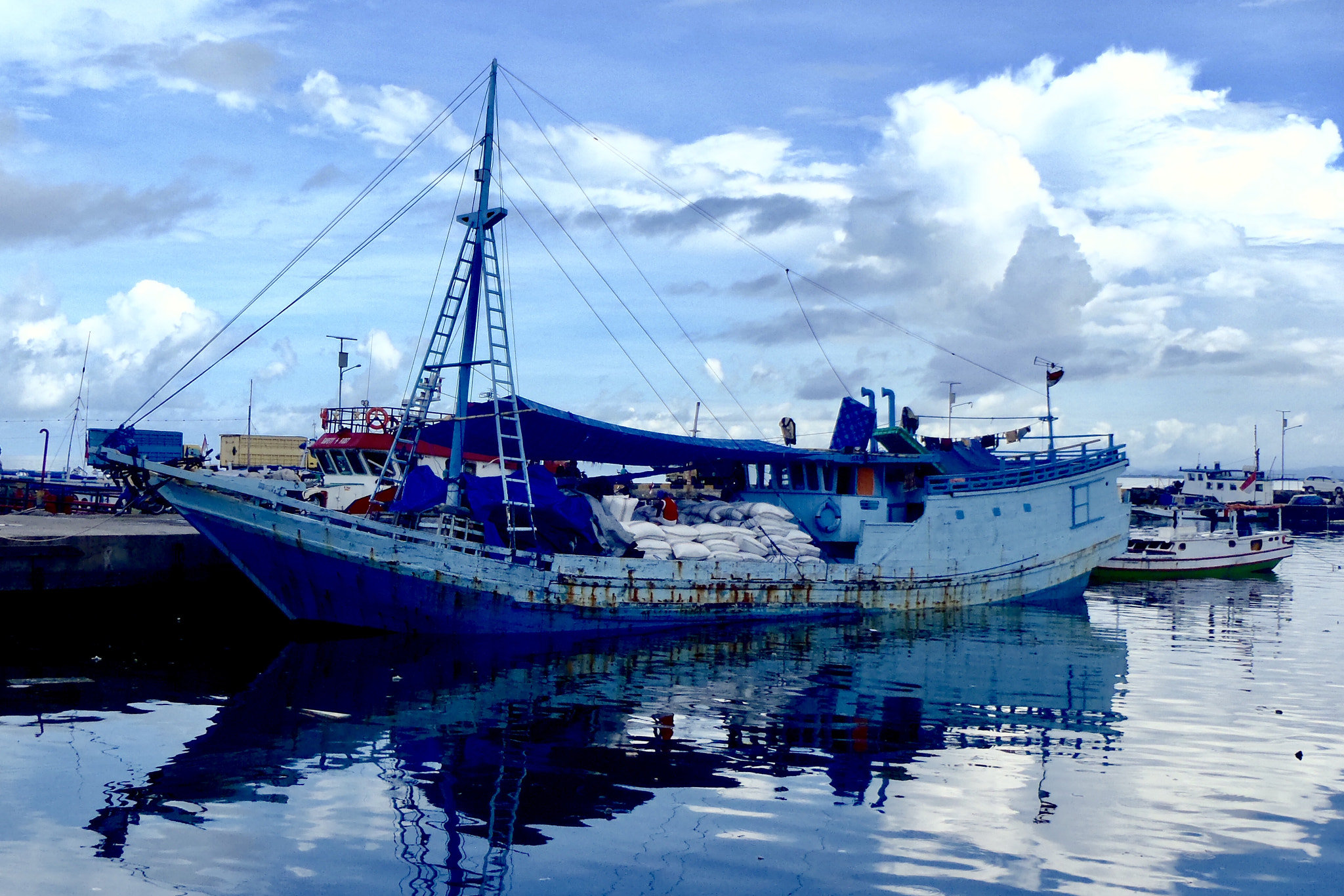 Olympus uTough-8010 sample photo. Ship in the fishing port of makassar photography