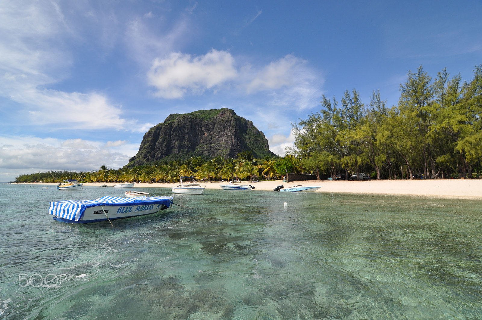 Nikon D90 sample photo. A tranquil boat floats photography