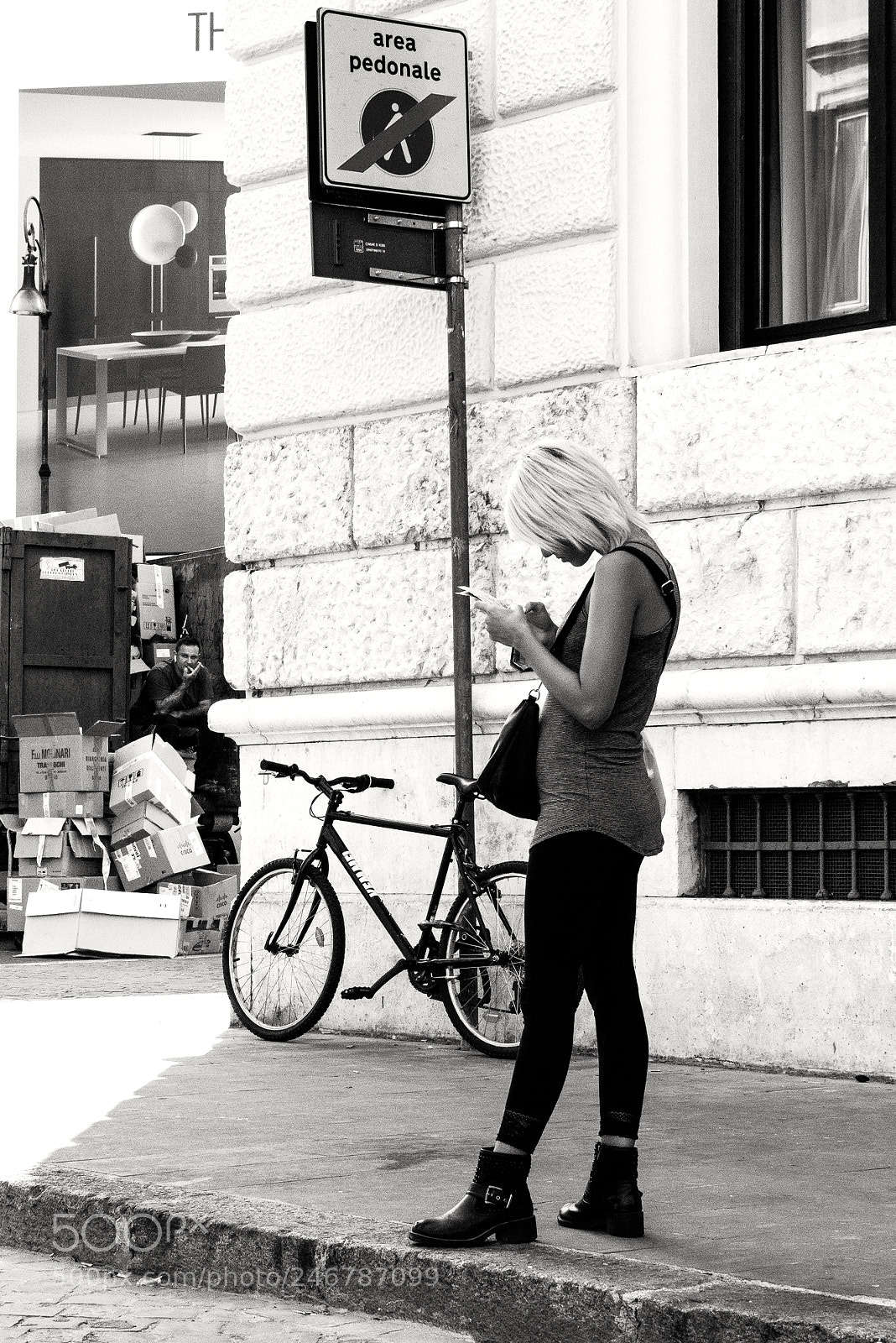 Sony a6500 sample photo. Woman, bicycle, man, dumpster photography