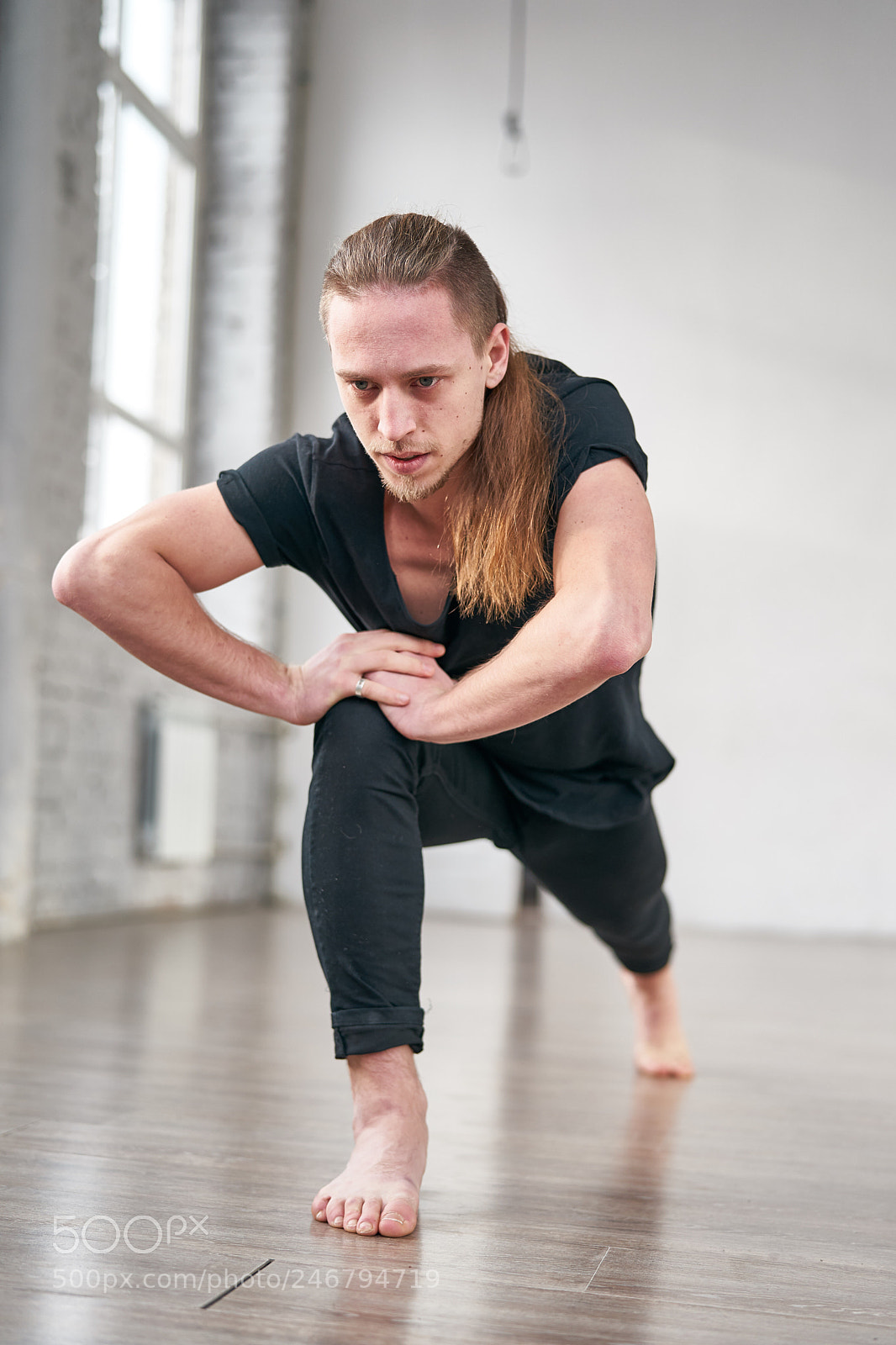 Sony a9 sample photo. Young fit man stretching photography