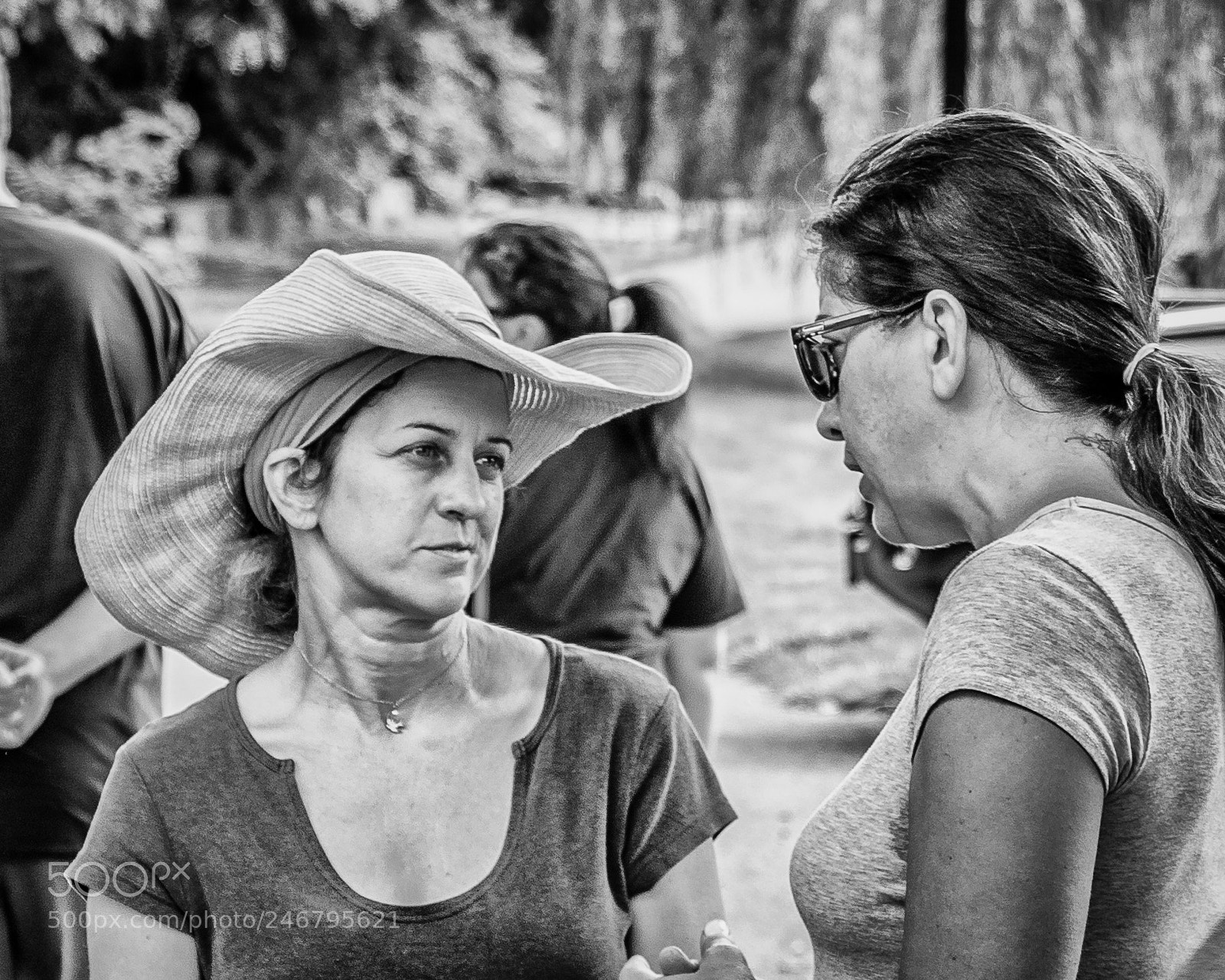 Canon EOS 7D Mark II sample photo. Woman wearing straw hat photography