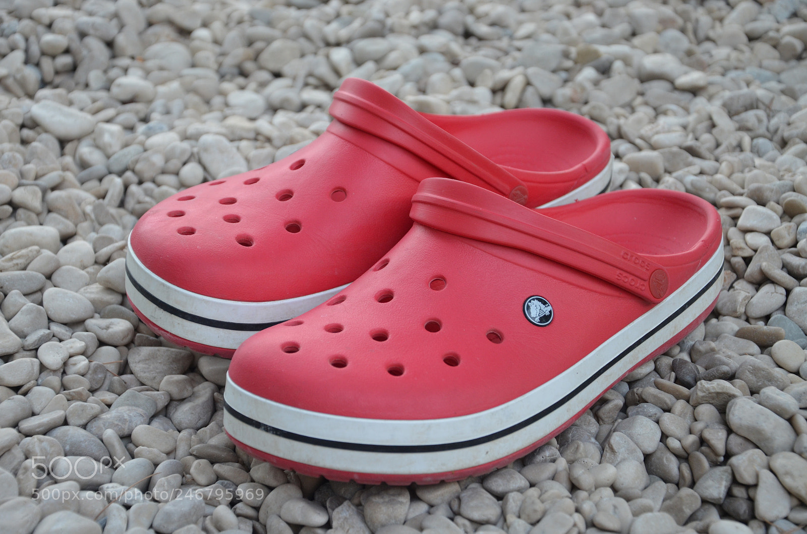 Nikon D5100 sample photo. Crocs on stones photography