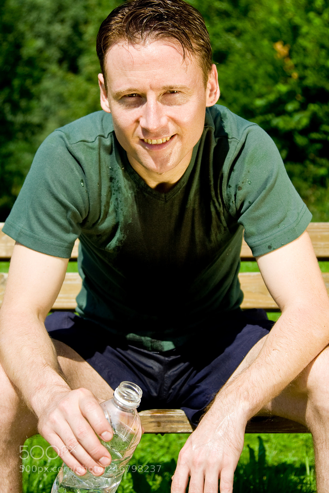 Canon EOS 40D sample photo. Male runner drinking water photography