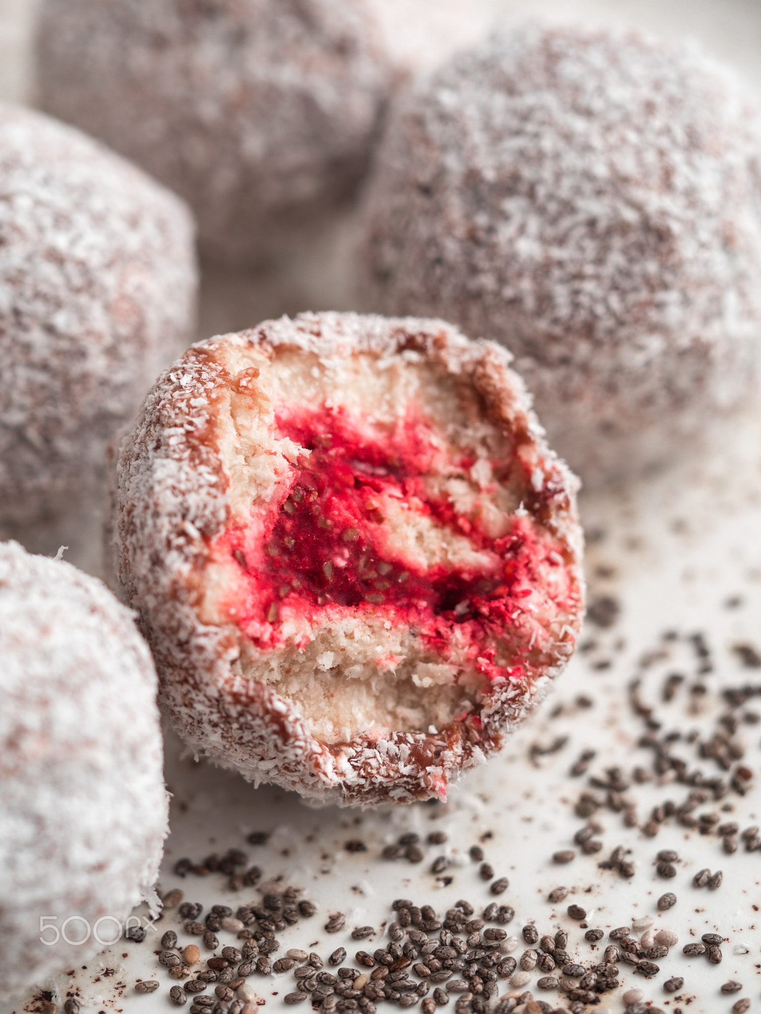 Raw lamington bliss balls with raspberries chia jam