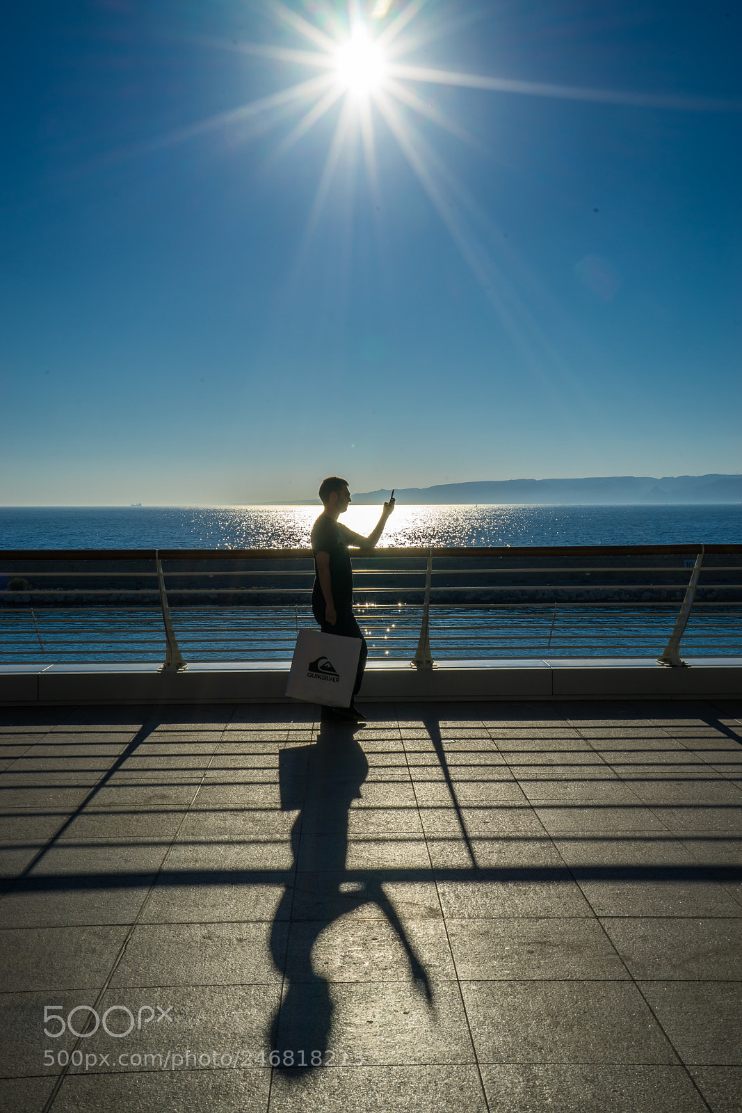 Sony a7 sample photo. Man in sun photography