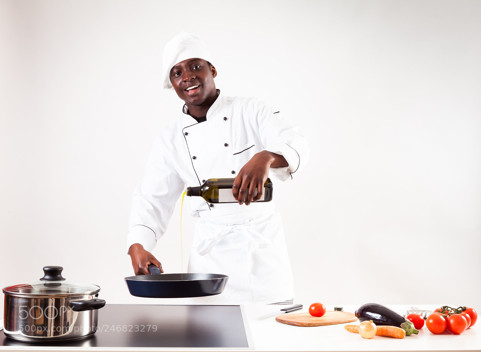 Canon EOS 5D Mark II sample photo. Chef cooking in his photography