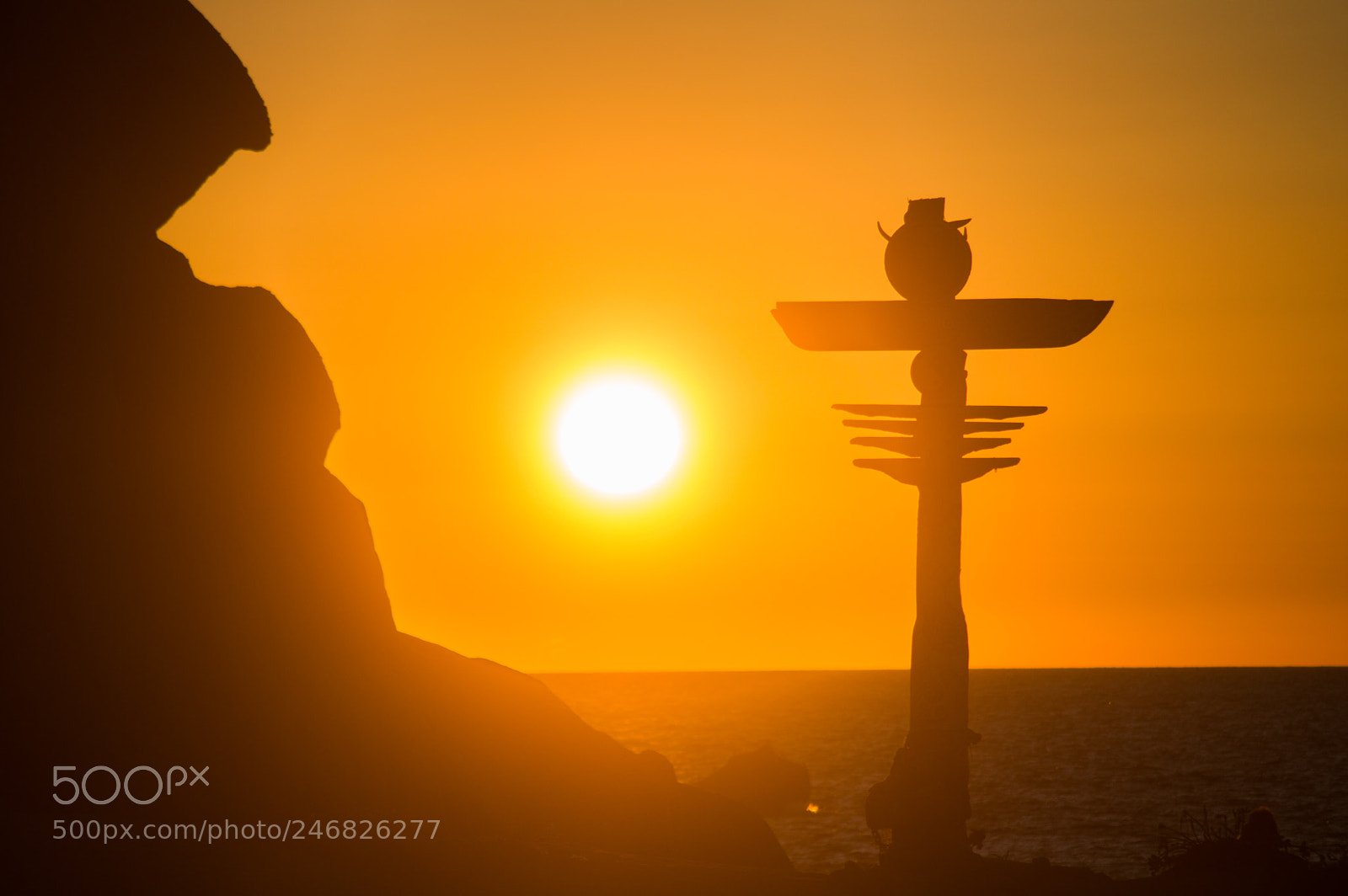 Nikon D3200 sample photo. Sunset with totem in photography