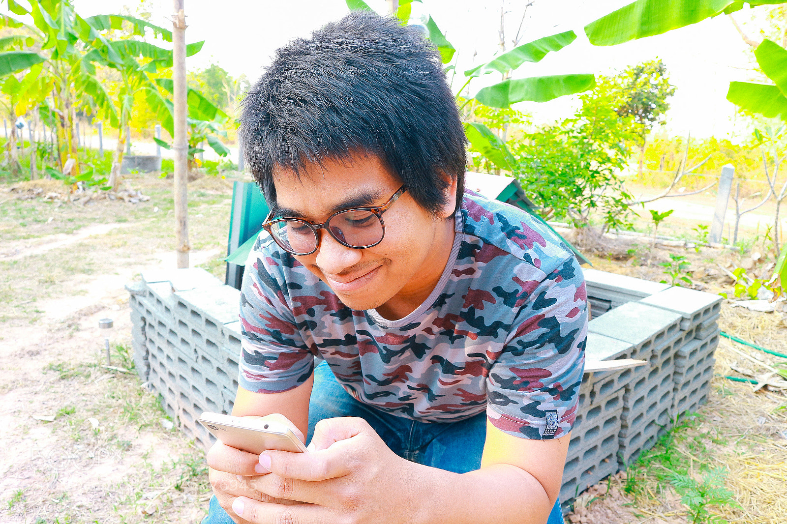 Canon EOS M10 sample photo. Brown skin soldier smile photography