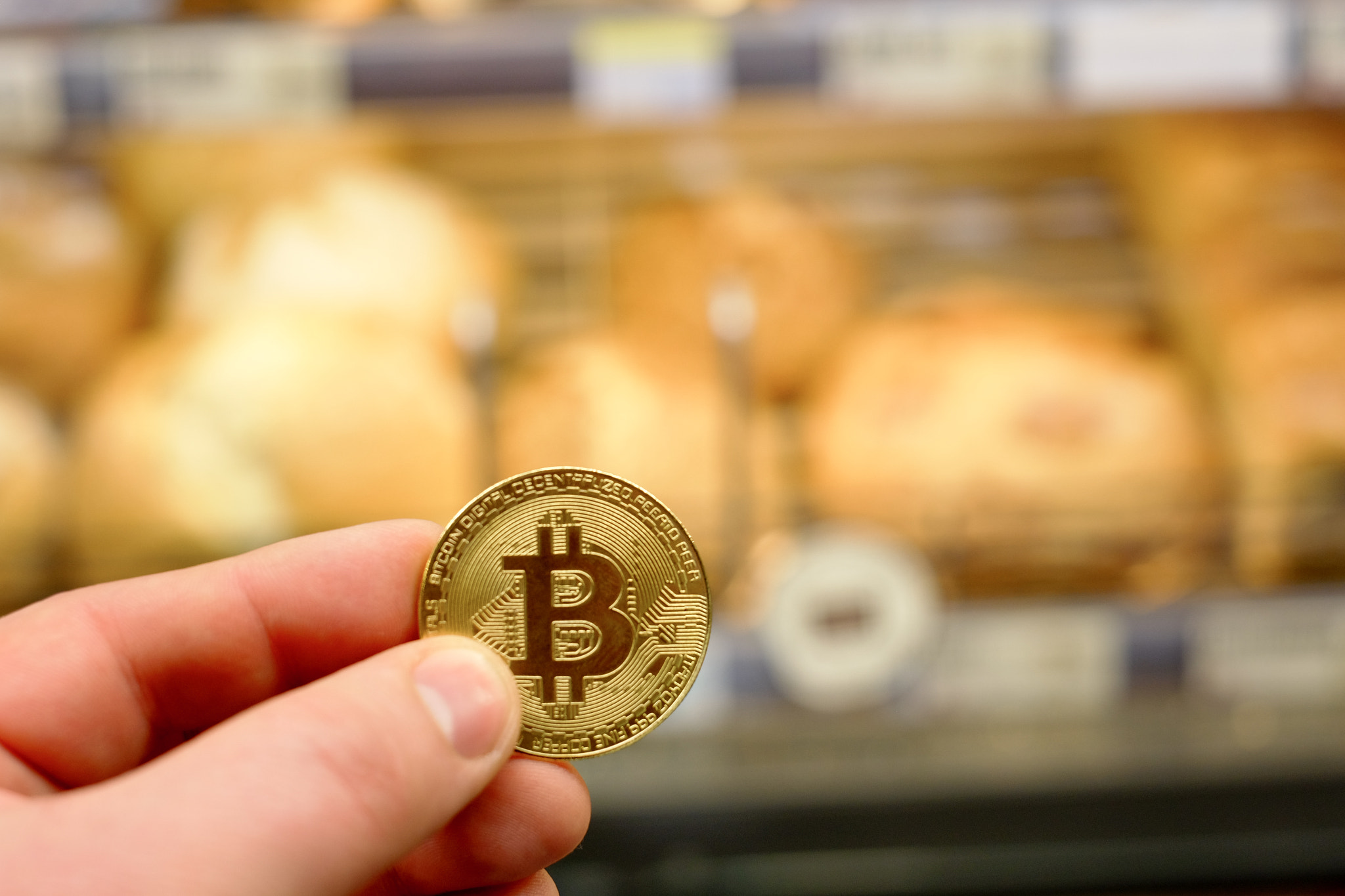 Bitcoin payment for food in a grocery store using cryptocurrency