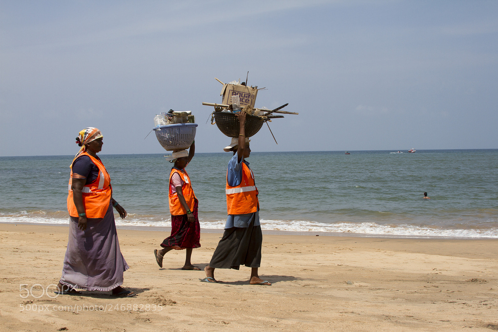 Canon EOS 7D sample photo. Women collect garbage on photography