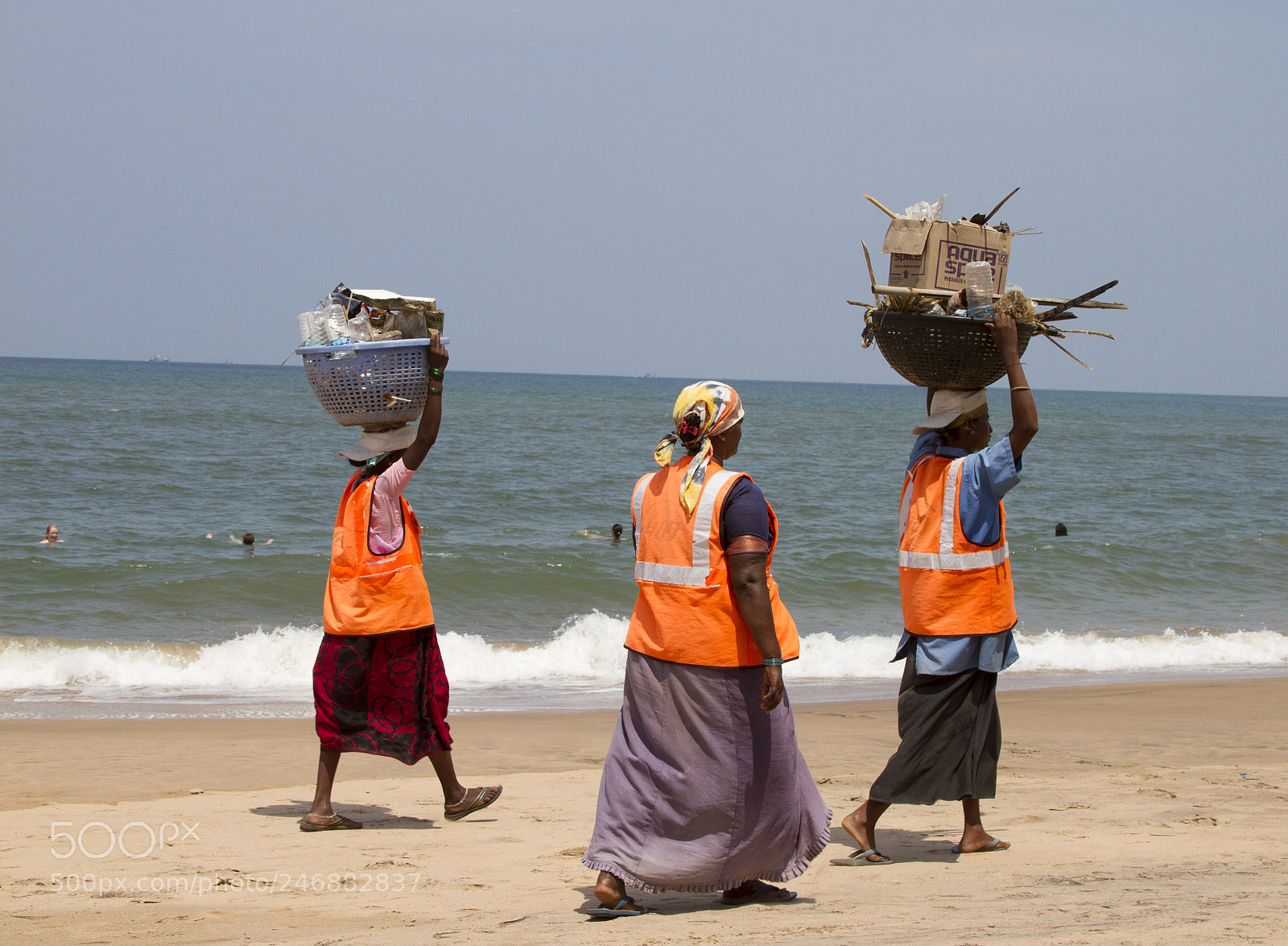 Canon EOS 7D sample photo. Women collect garbage on photography