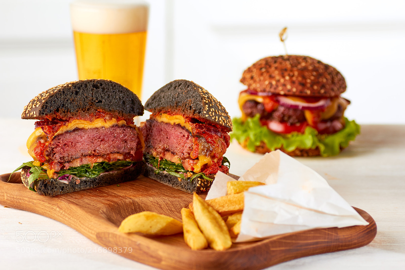 Canon EOS 60D sample photo. Sliced juicy burger with photography