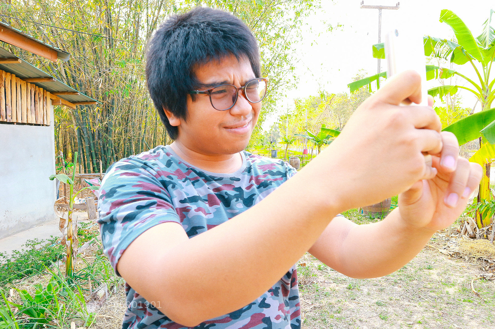 Canon EOS M10 sample photo. Brown skin soldier smile photography