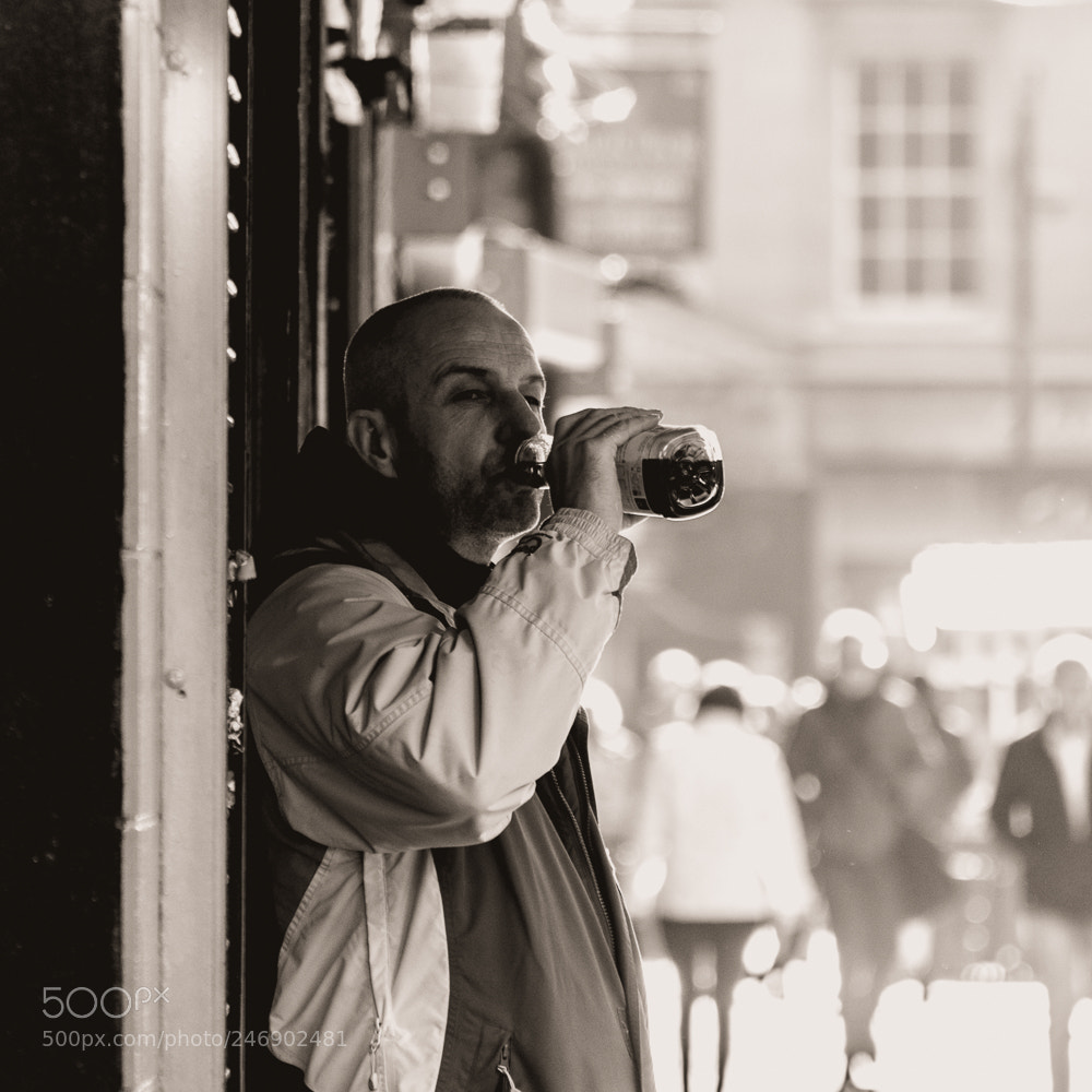 Nikon D5600 sample photo. Man drinking photography