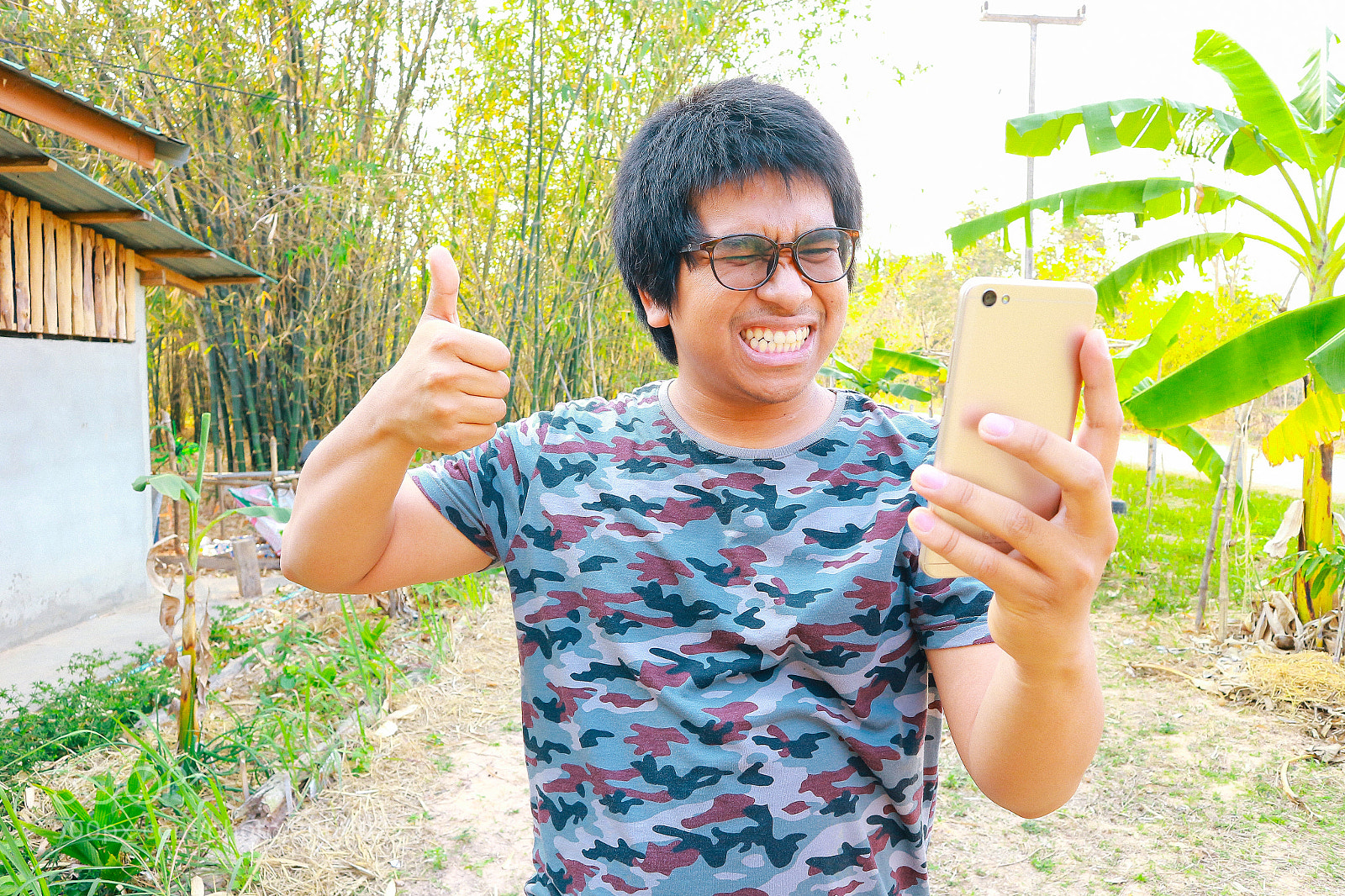 Canon EOS M10 sample photo. Brown skin soldier smile photography