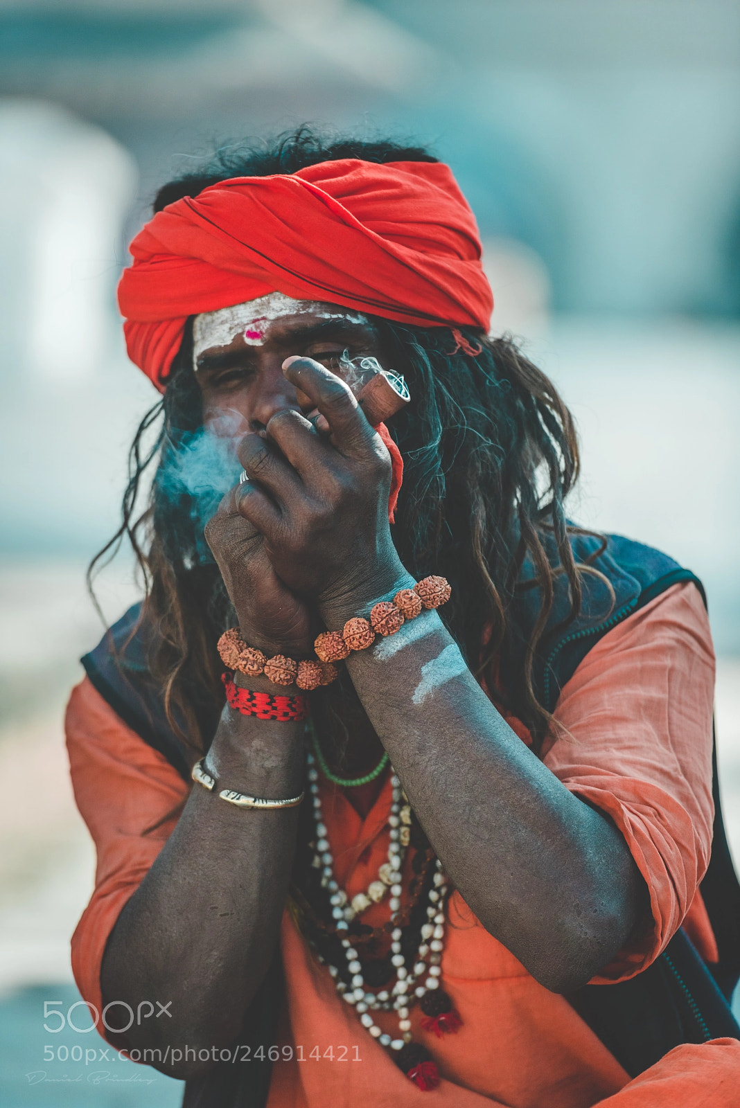 Nikon D810 sample photo. Nepali priest smoking photography