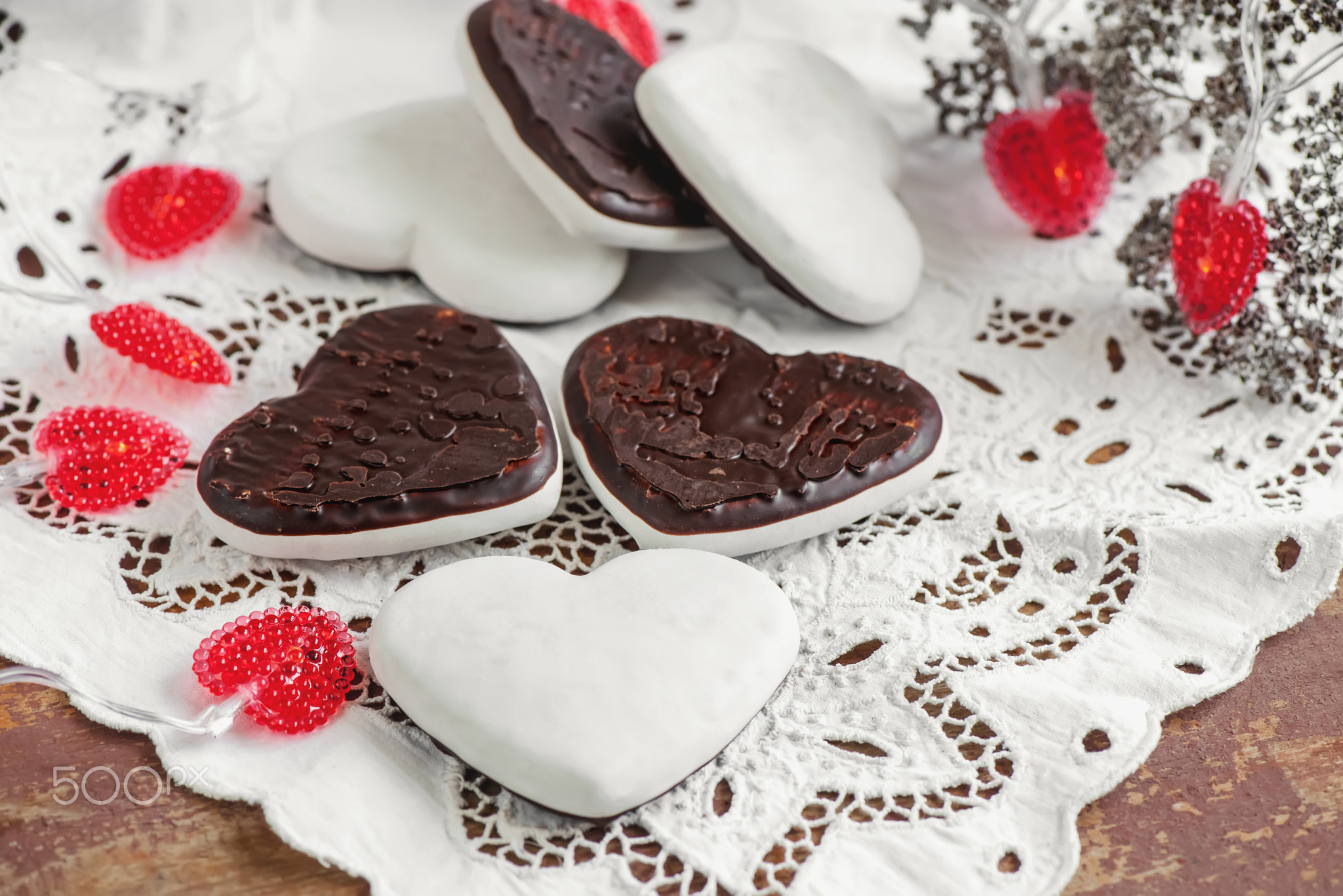 Sweet cookies in the form of hearts from gingerbread dough chocolate and a white glaze....