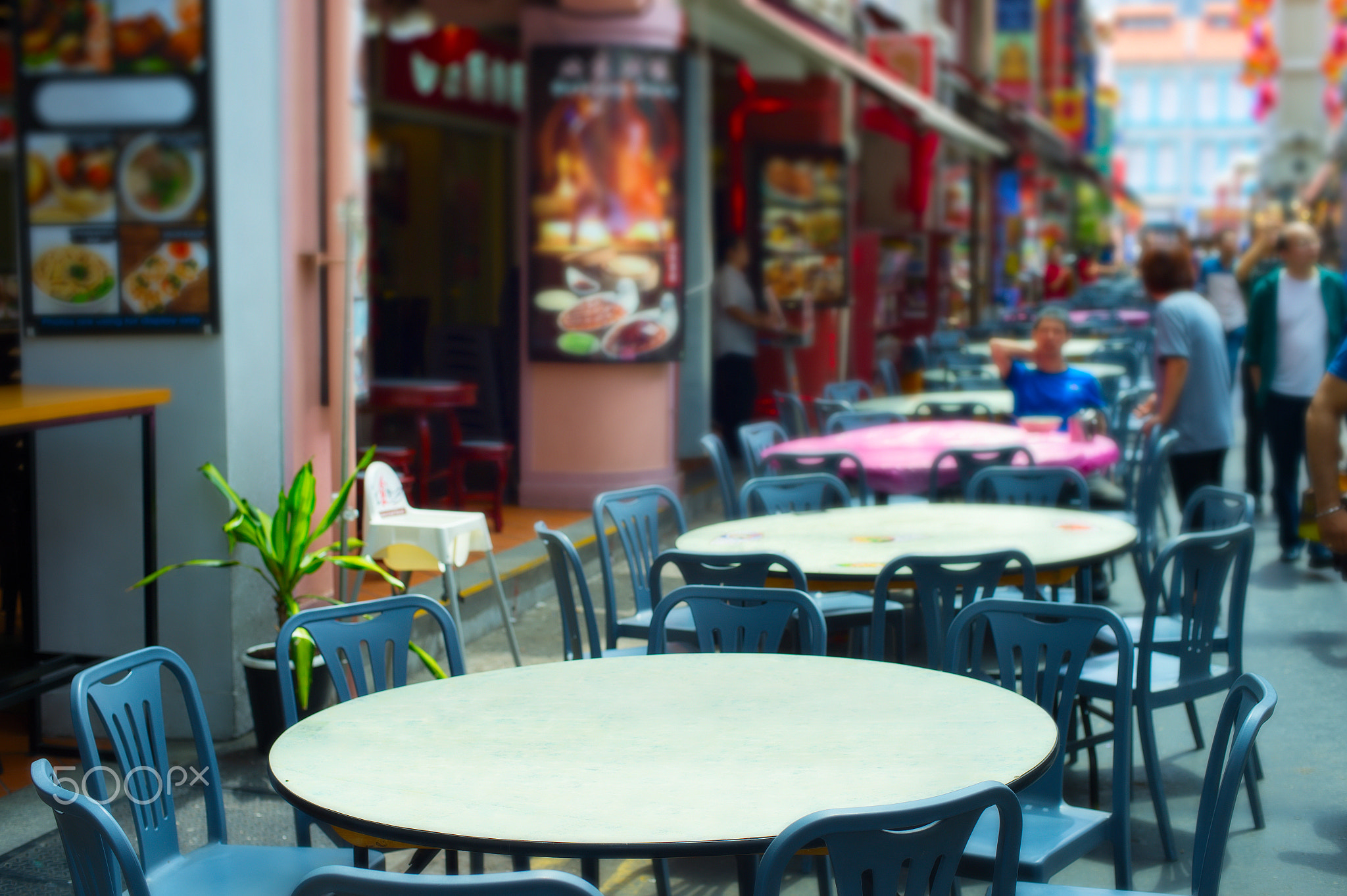 Street restaurant tables. Singapore Chinatown