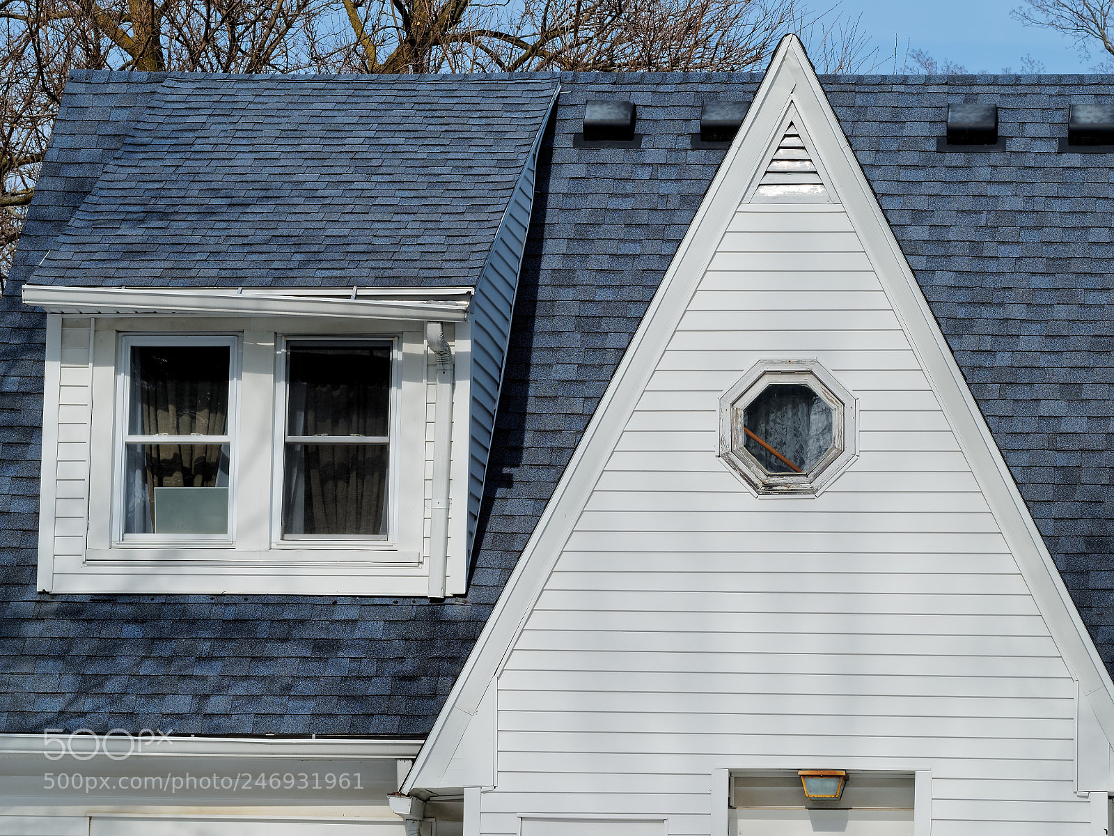 Olympus OM-D E-M1 sample photo. House with loose gutter photography