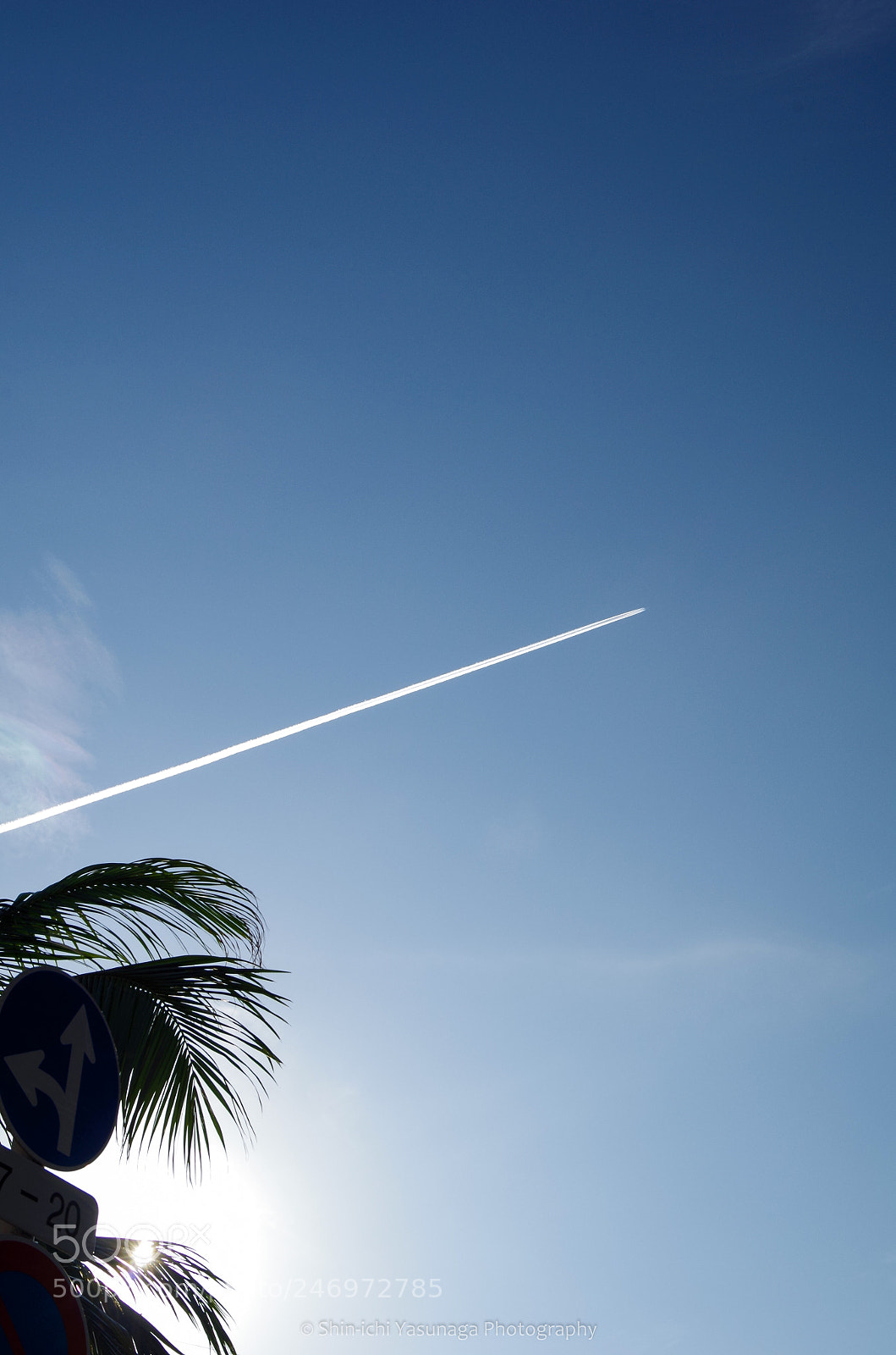Pentax K-30 sample photo. Contrail in the city photography