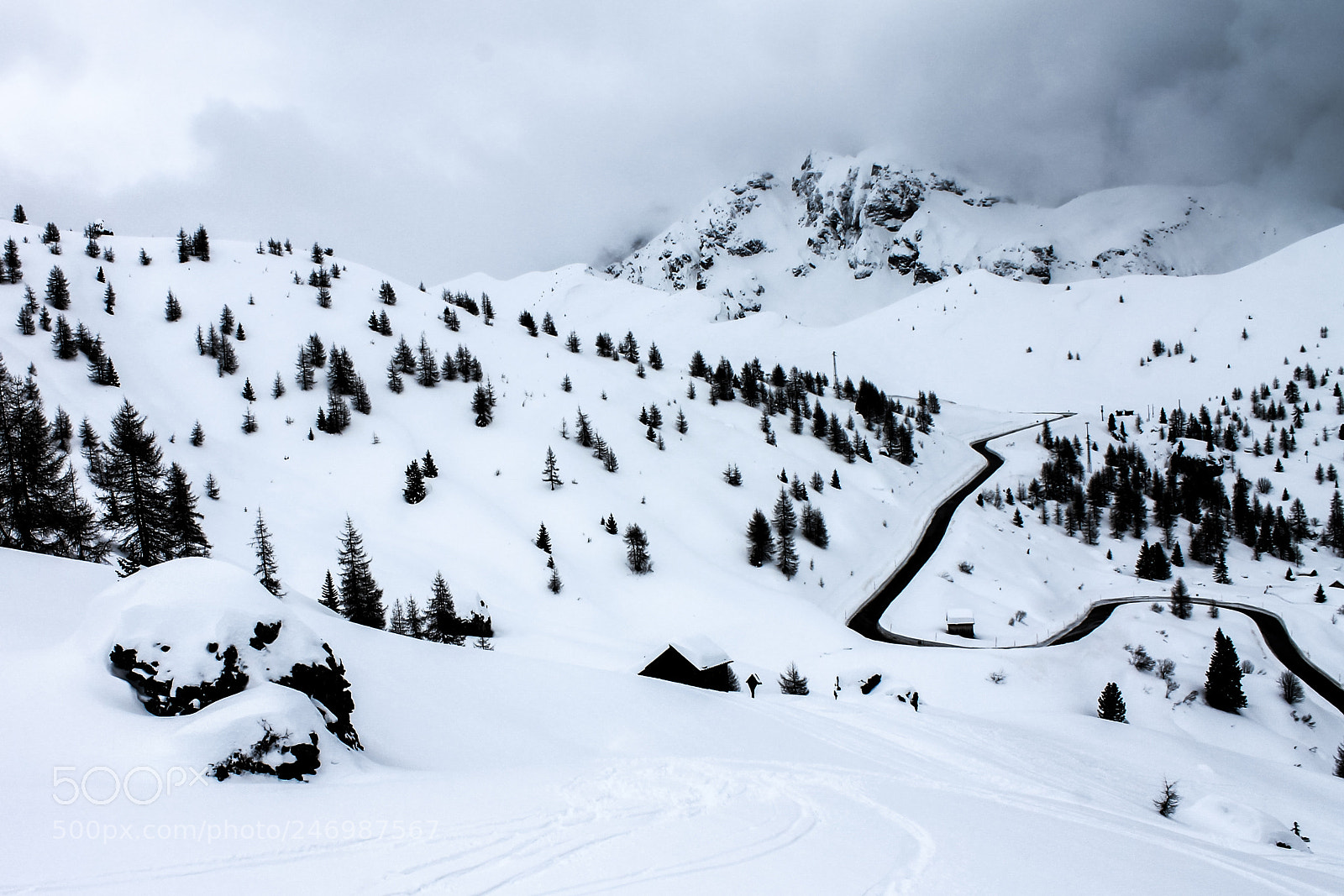 Canon EOS 1100D (EOS Rebel T3 / EOS Kiss X50) sample photo. Road through snowy mountains photography