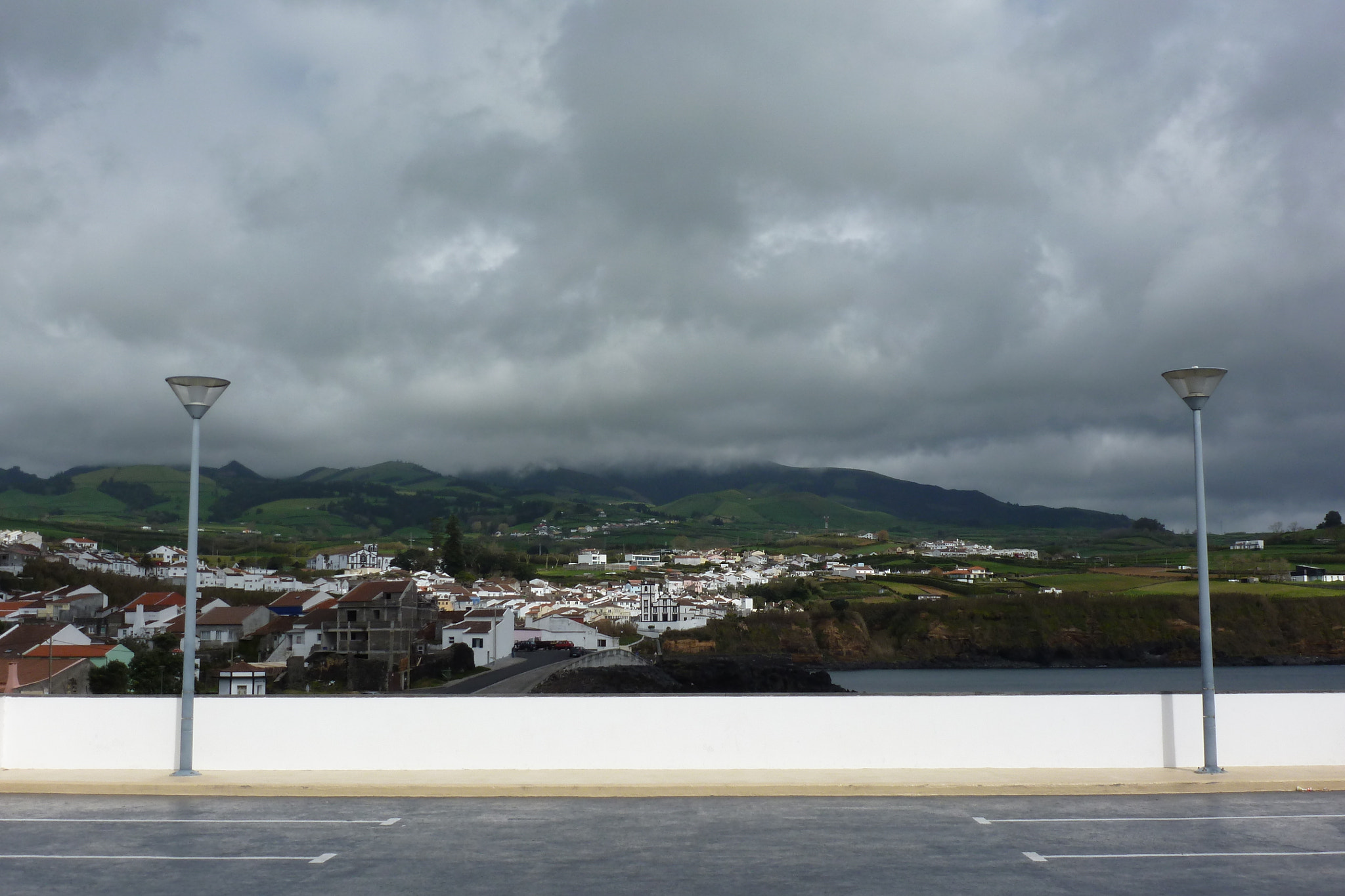 Panasonic Lumix DMC-ZS8 (Lumix DMC-TZ18) sample photo. Clouds over the island photography